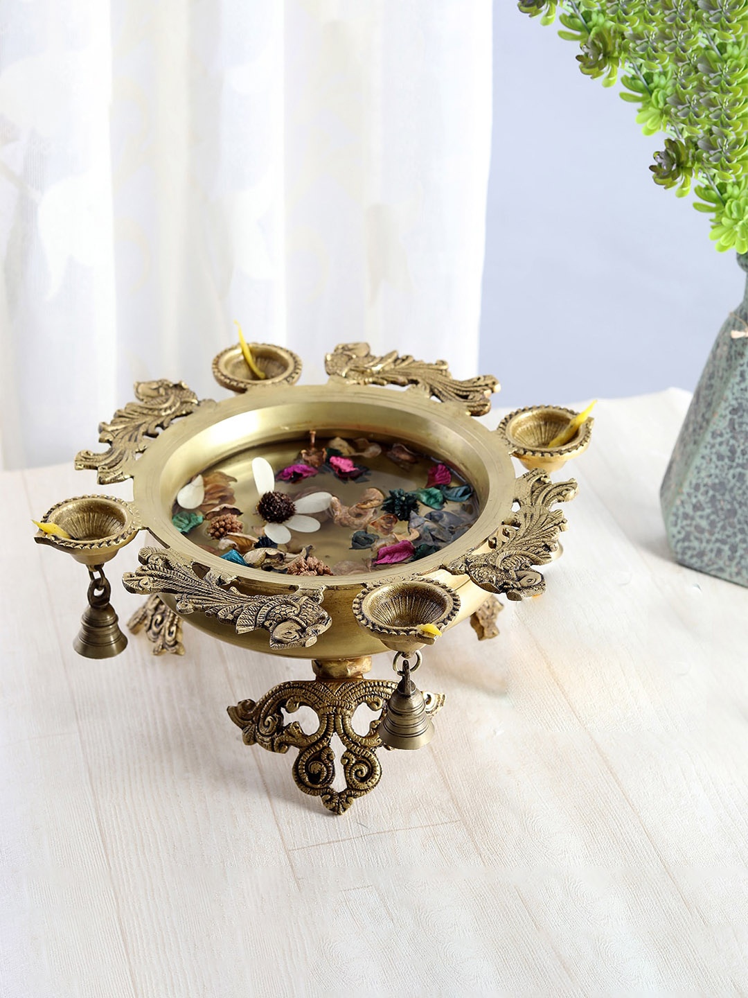 

Two Moustaches Gold-Toned Peacock Design Urli Bowl