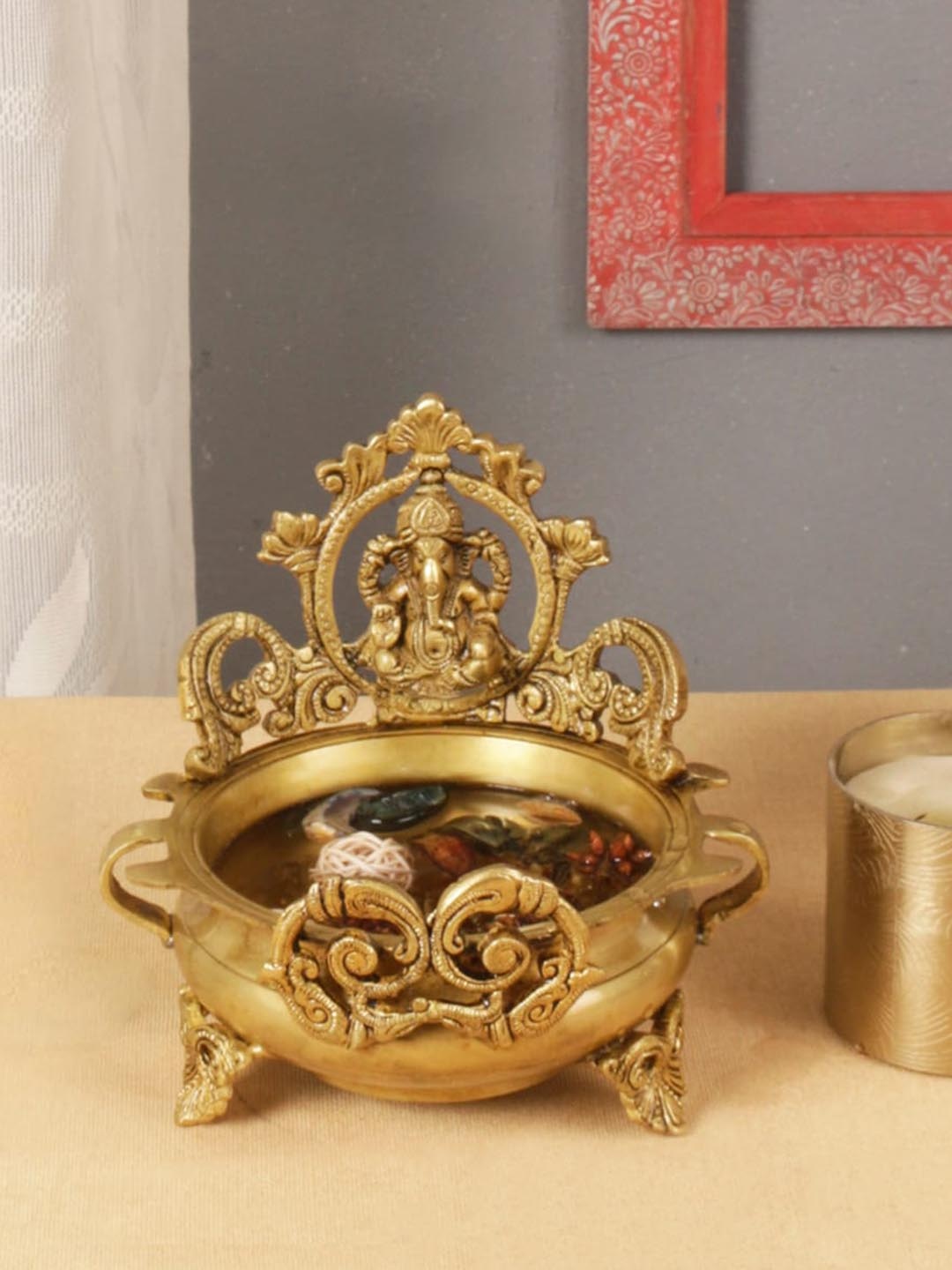 

Two Moustaches Golden Brass Ethnic Carved Ganesha Design Urli Decor Bowl, Gold