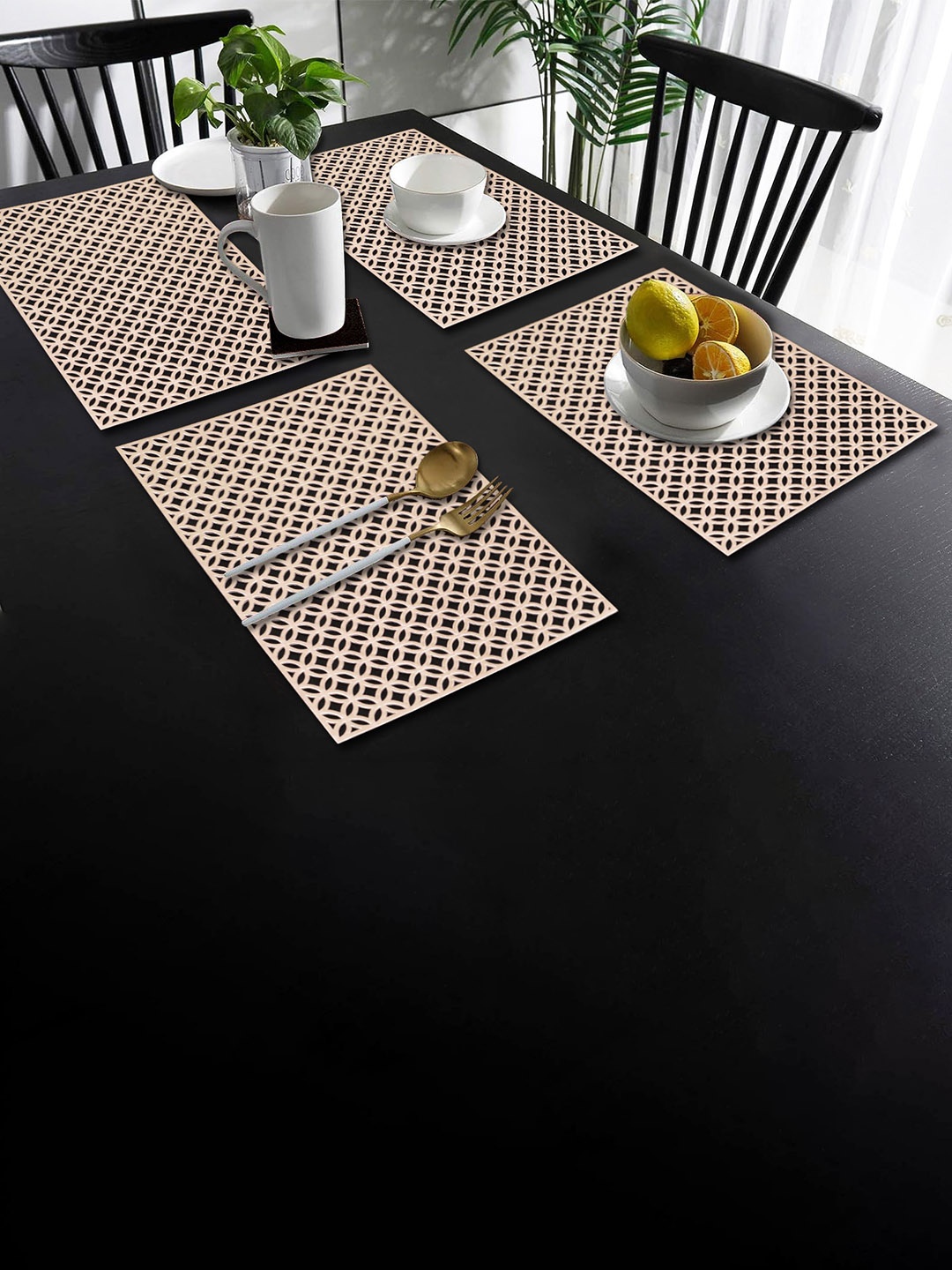 

Dakshya Industries Gold Toned 4 Pieces Rectangular Table Placemats