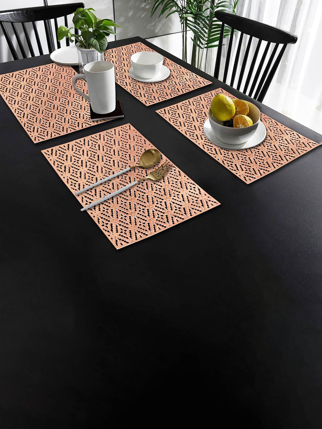

Dakshya Industries Copper Toned 4 Pieces Rectangular Table Placemats