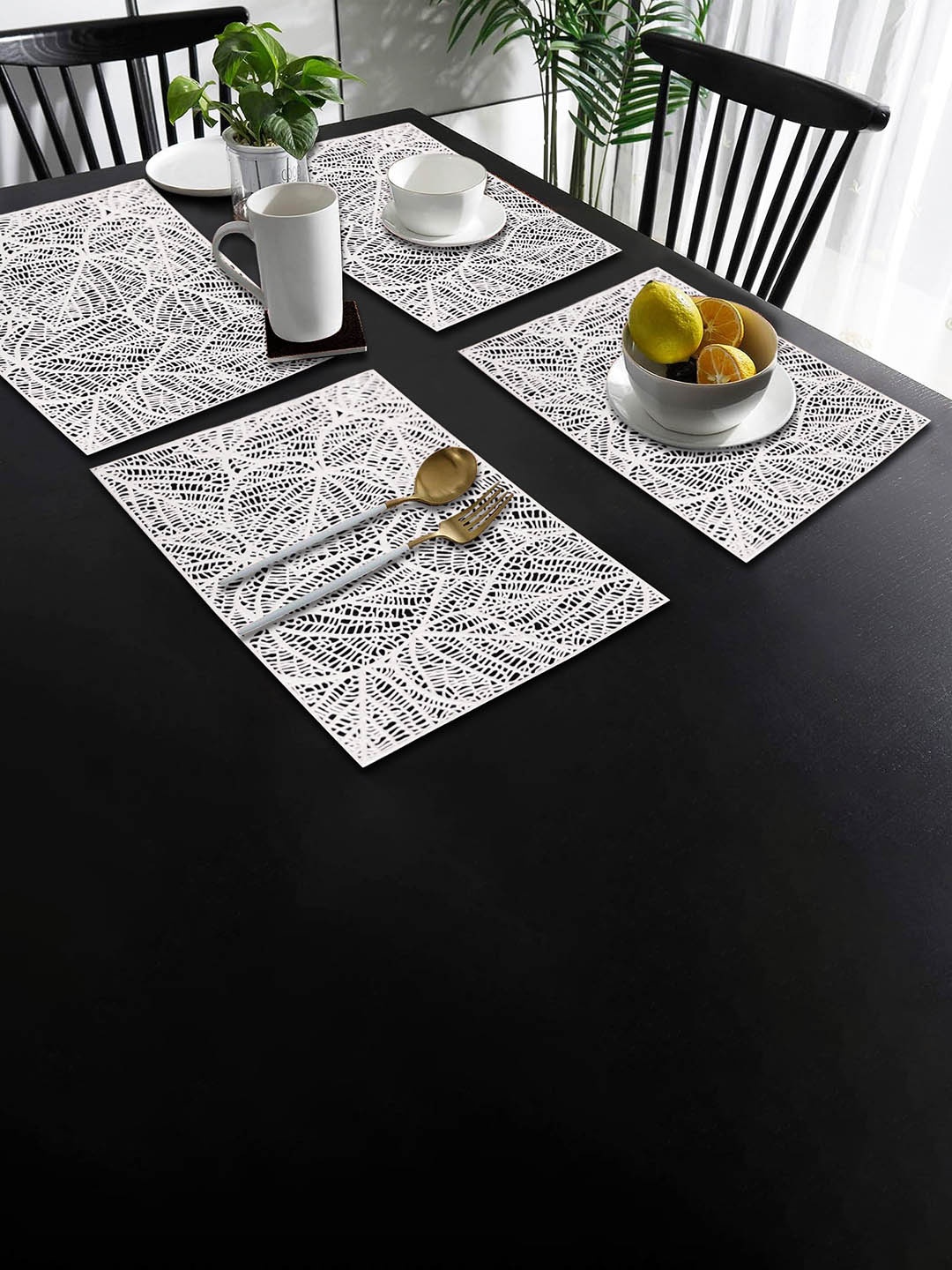 

Dakshya Industries Silver Toned 4 Pieces Rectangular Table Placemats