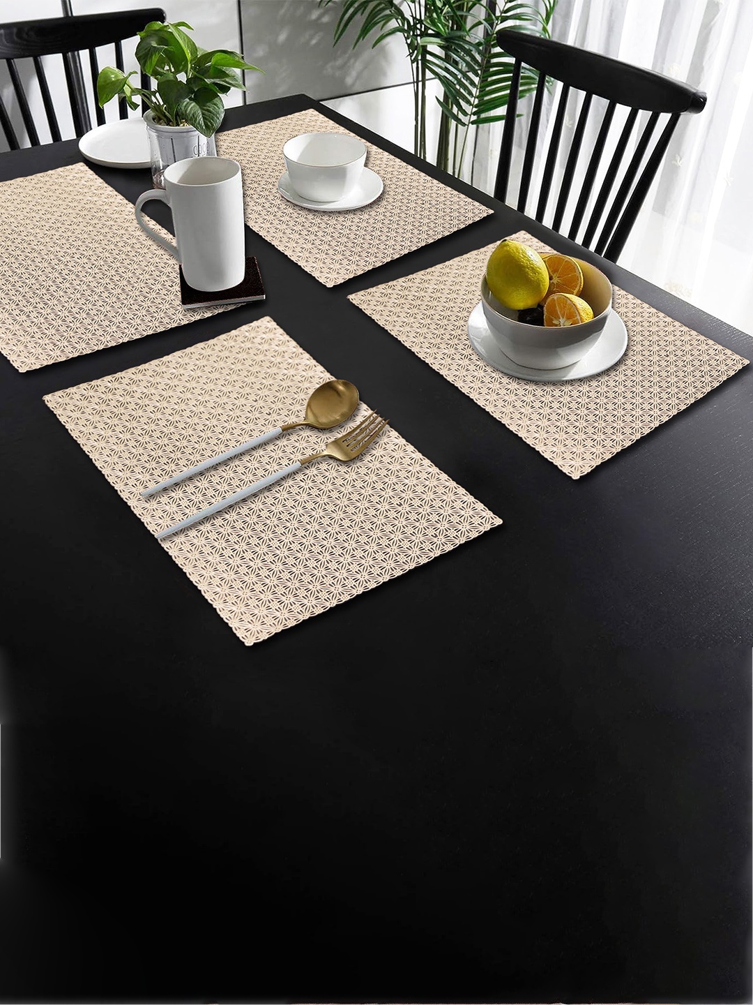 

Dakshya Industries Gold-Toned 4-Pieces Rectangular Table Placemats