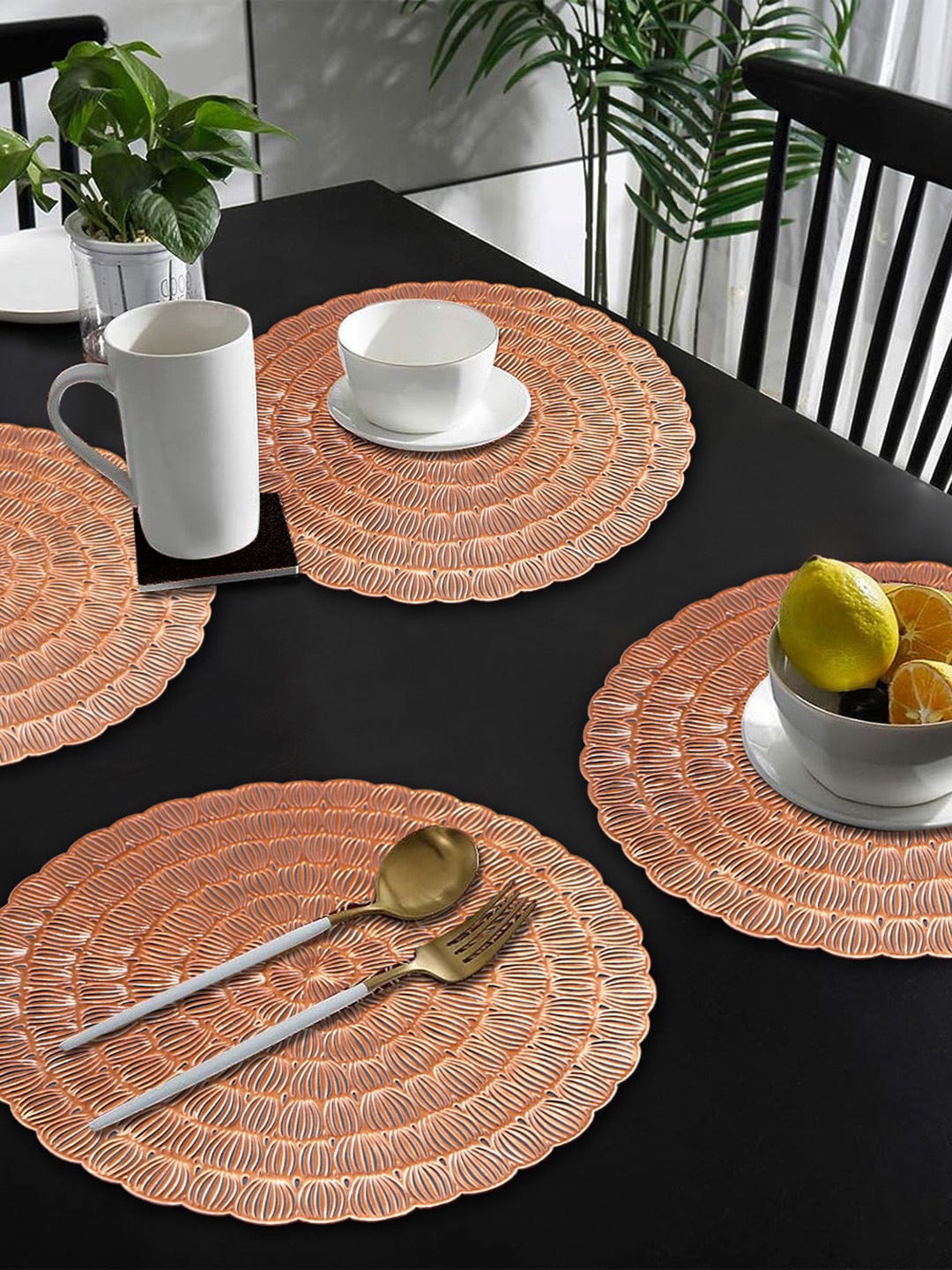 

Dakshya Industries Copper Toned 4 Pieces Floral Round Table Placemats