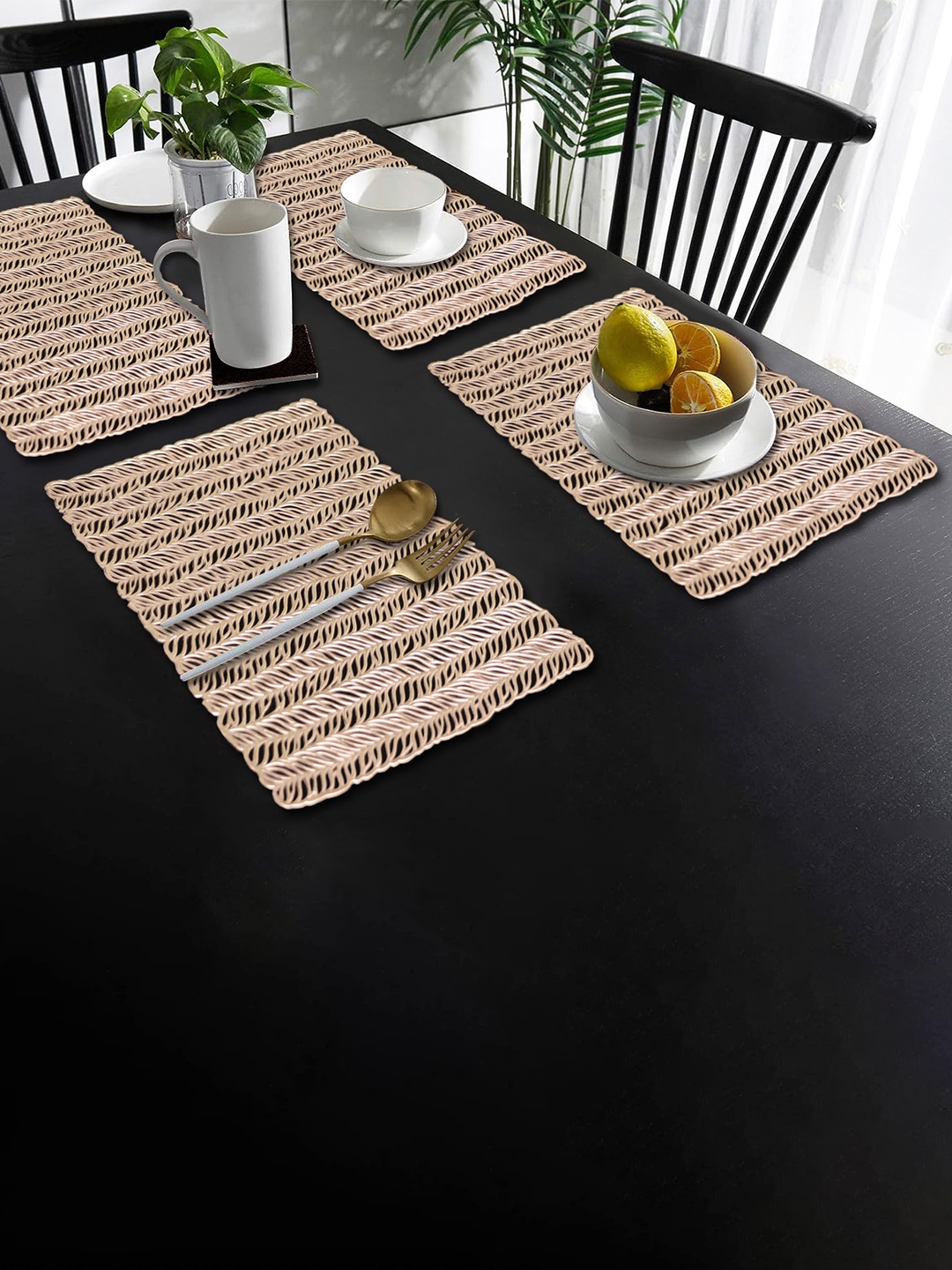 

Dakshya Industries Gold Toned 4 Pieces Floral Rectangular Table Placemats