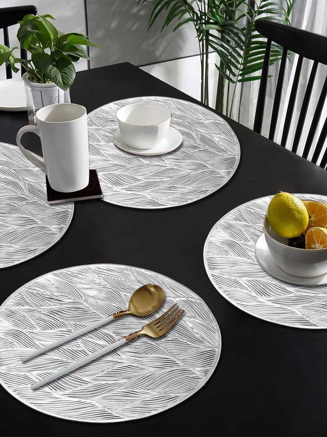 

Dakshya Industries Silver Toned 4 Pieces Textured Circular Table Placemats