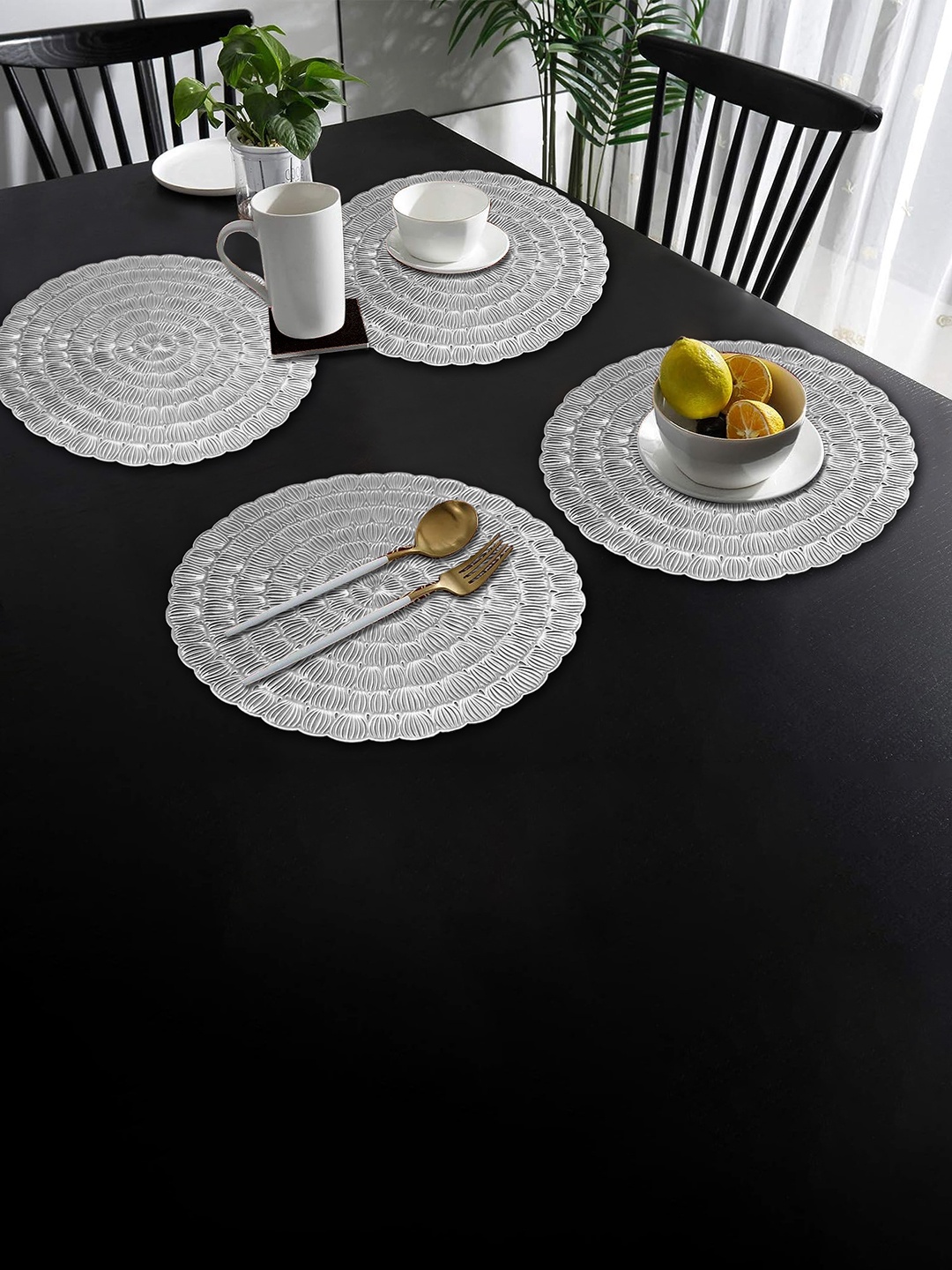 

Dakshya Industries Silver 4-Pieces Round Table Placemats
