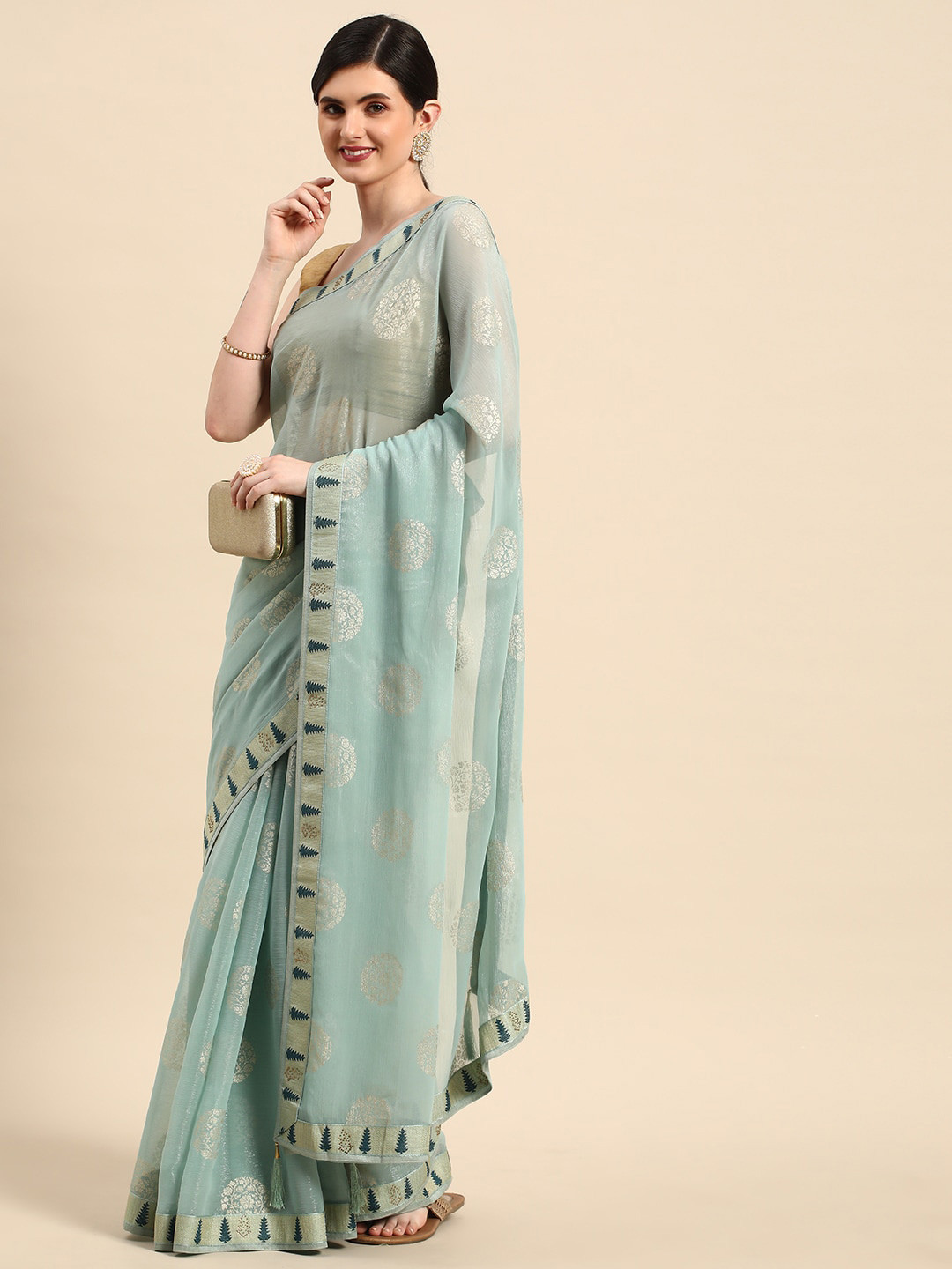 

Mitera Turquoise Blue & Gold-Toned Ethnic Motifs Zari Pure Chiffon Saree