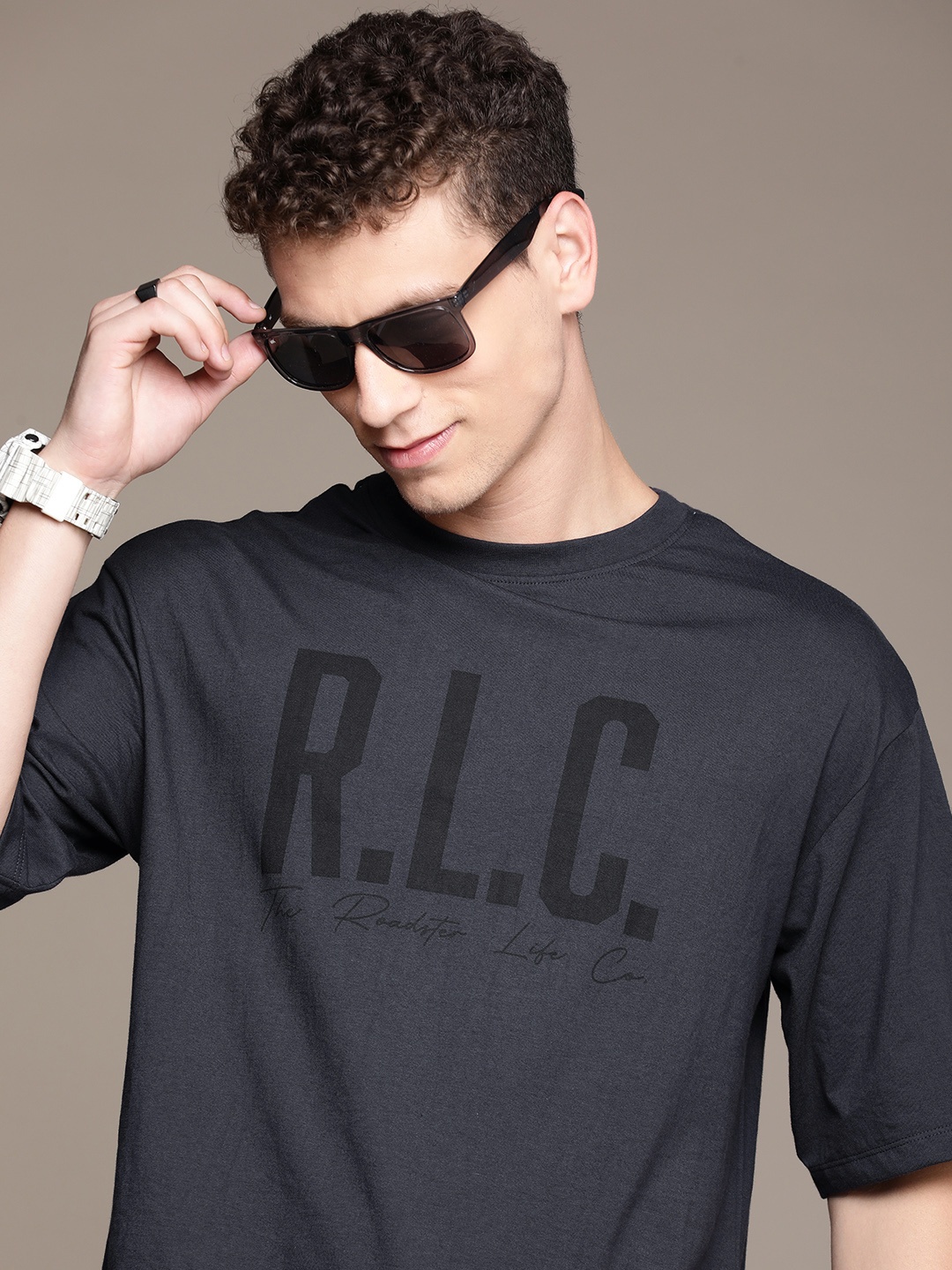 

The Roadster Lifestyle Co. Oversized Fit Men Typography Printed Pure Cotton T-shirt, Black