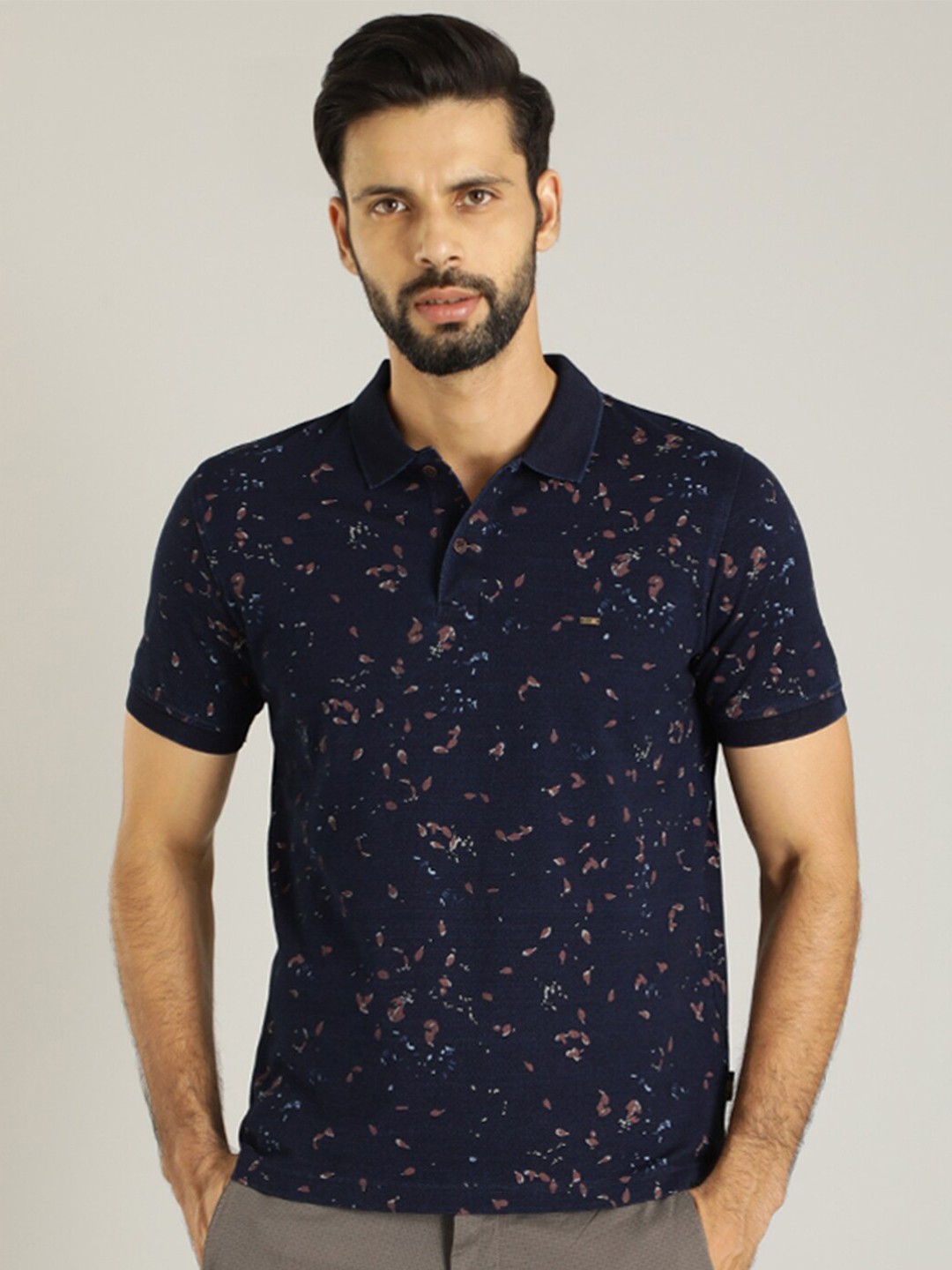 

Indian Terrain Abstract Printed Polo Collar Pure Cotton T-shirt, Navy blue