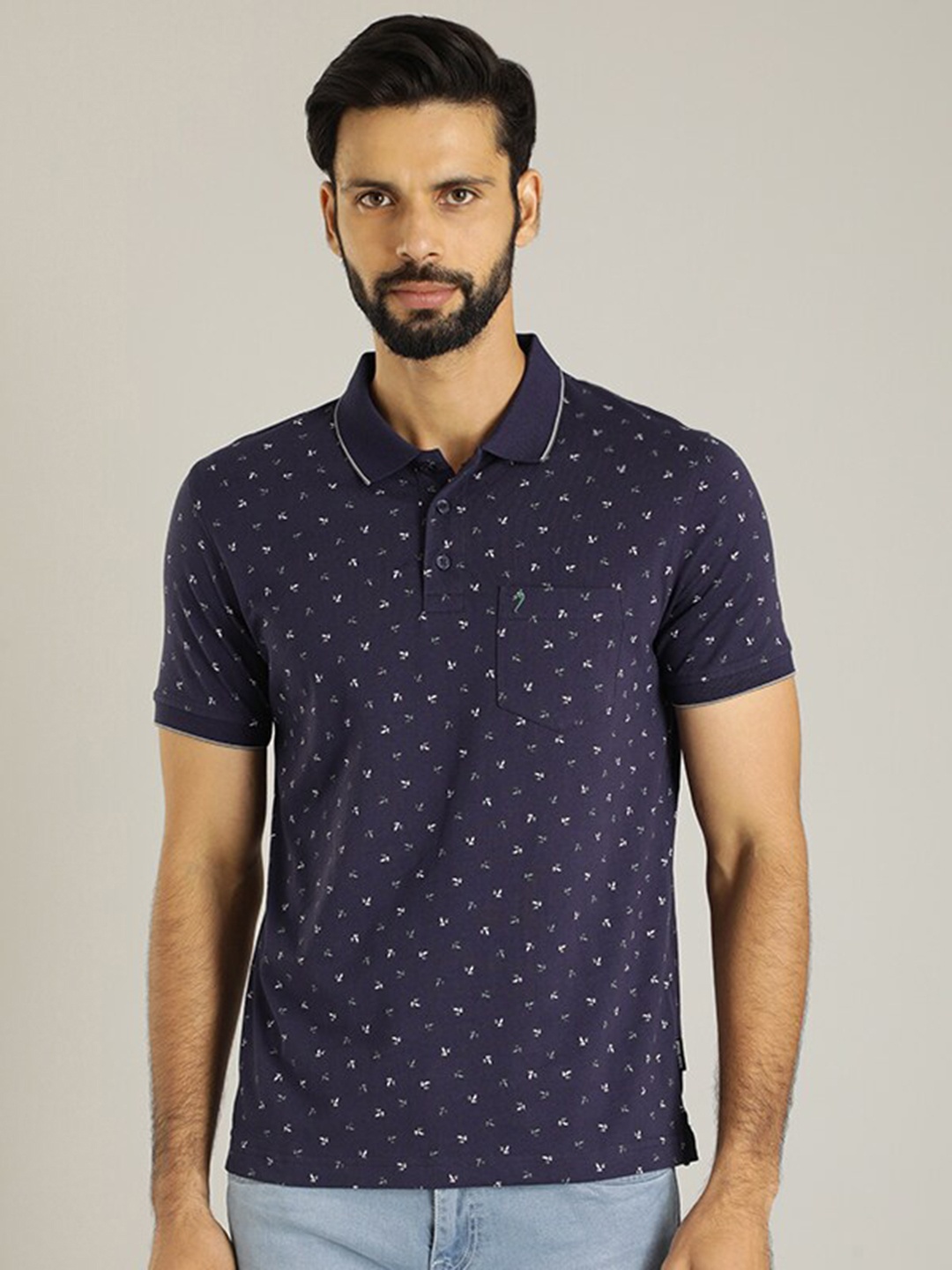 

Indian Terrain Abstract Printed Polo Collar Pure Cotton T-shirt, Navy blue