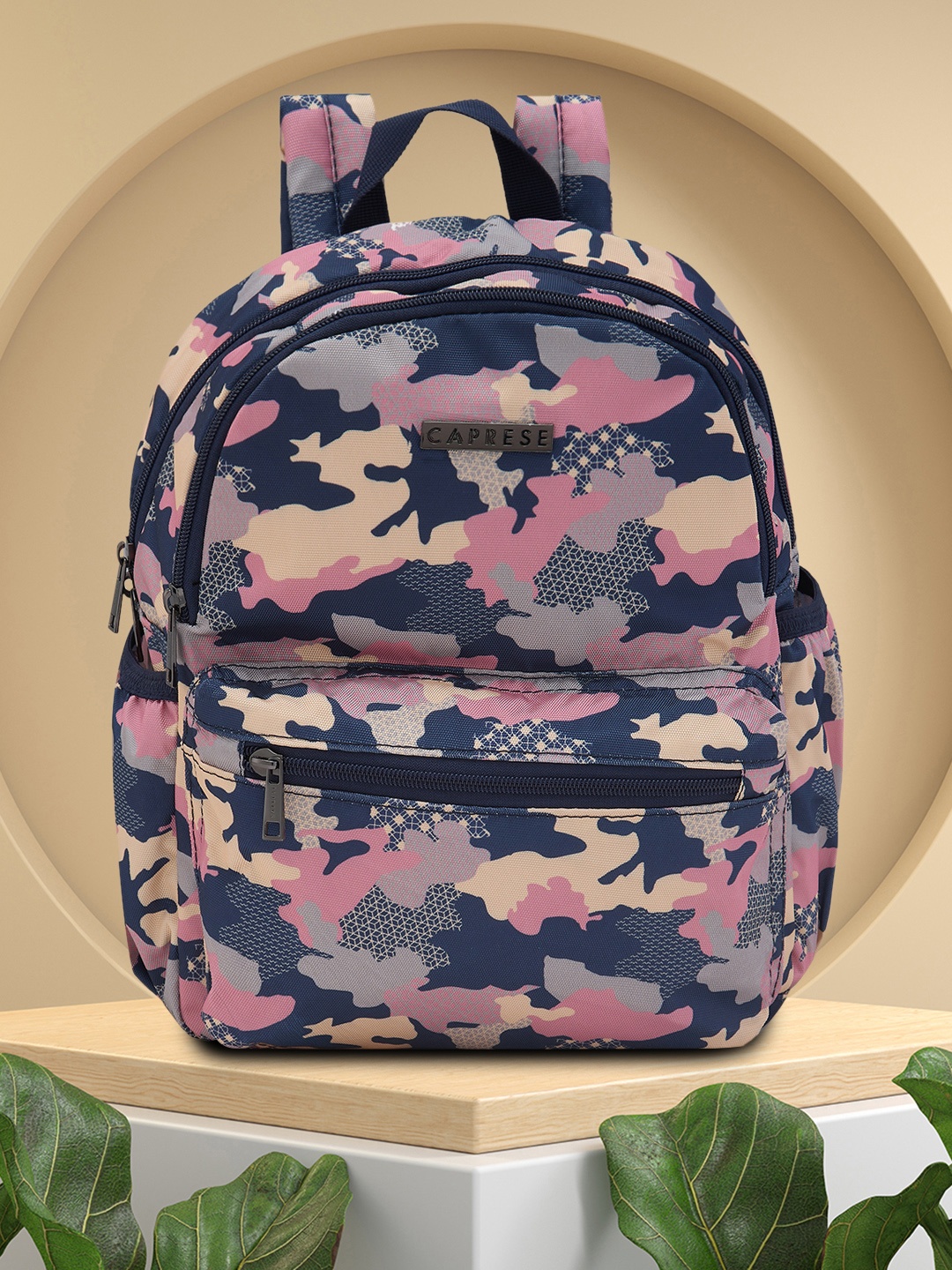 

Caprese Women Cole Abstract Printed Backpack, Navy blue