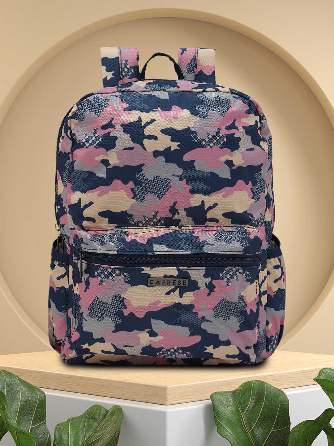 

Caprese Women Cole Abstract Printed Backpack, Navy blue