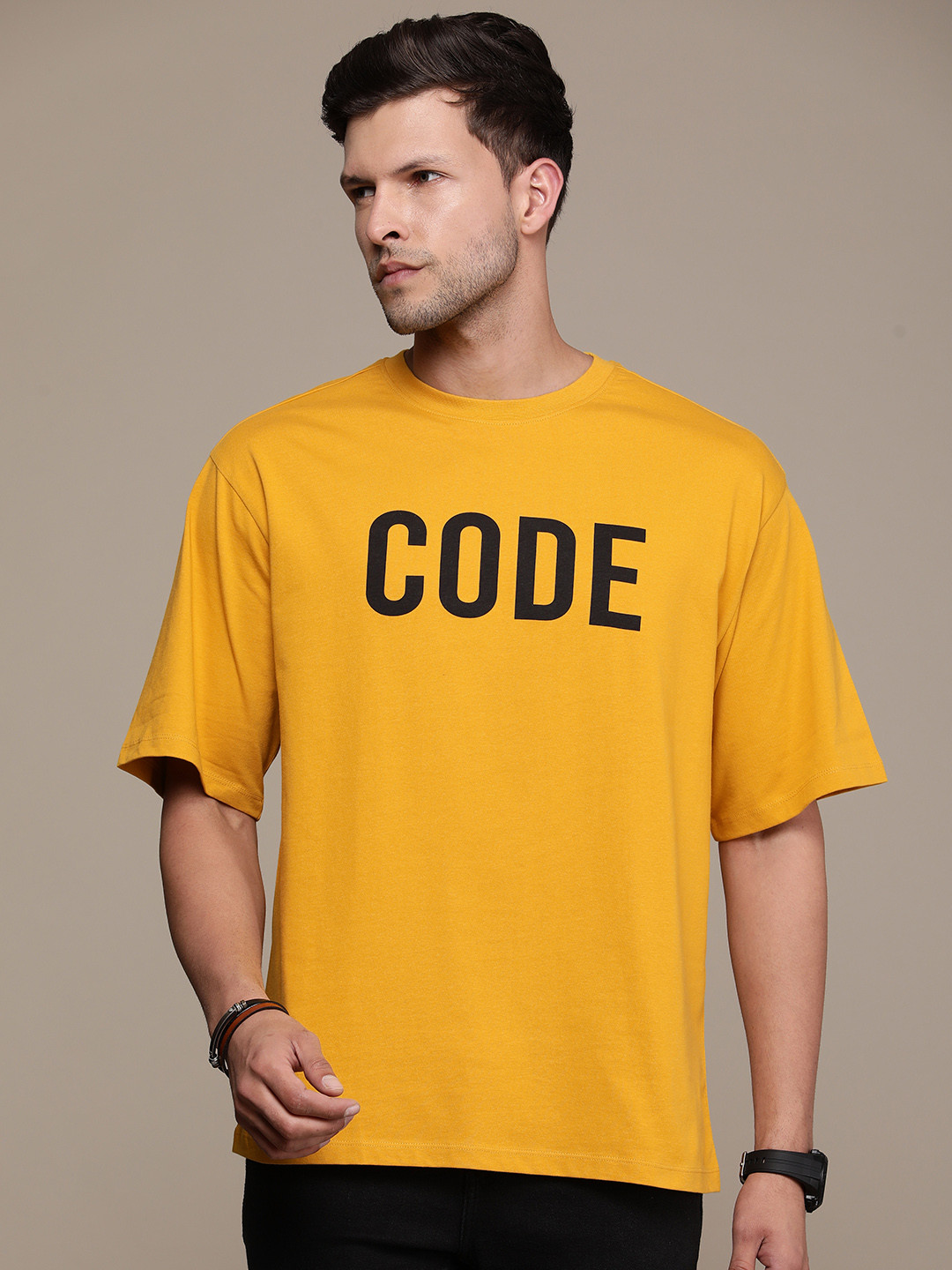 

The Roadster Life Co. Pure Cotton Typography Printed Drop-Shoulder Sleeves Casual T-shirt, Yellow