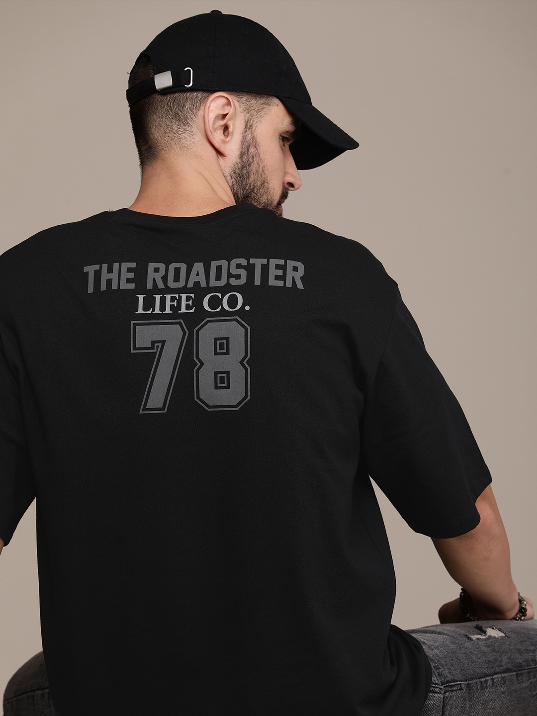 

The Roadster Lifestyle Co. Oversized Fit Pure Cotton Brand Logo Printed Drop-Shoulder Sleeves Casual T-shirt, Black