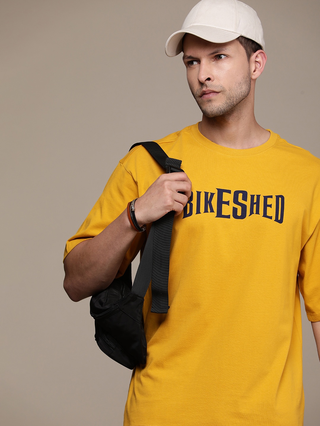 

The Roadster Lifestyle Co. Oversized Fit Typography Printed Pure Cotton T-shirt, Mustard