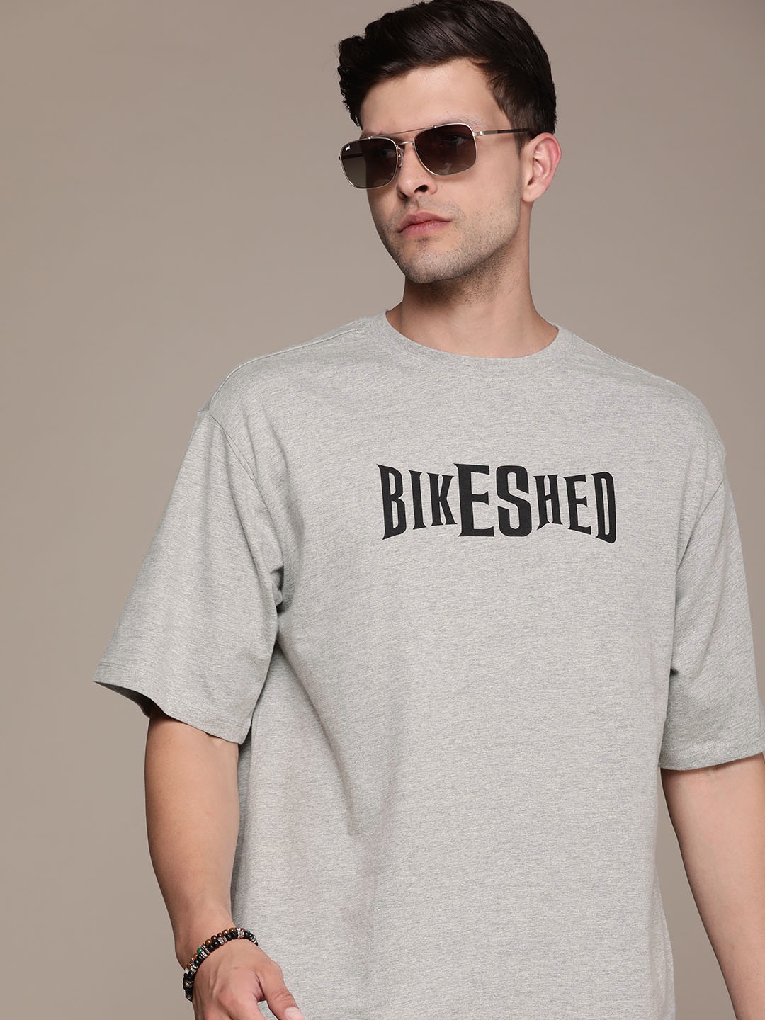 

Roadster Men Typography Printed Drop-Shoulder Sleeves Pure Cotton T-shirt, Grey