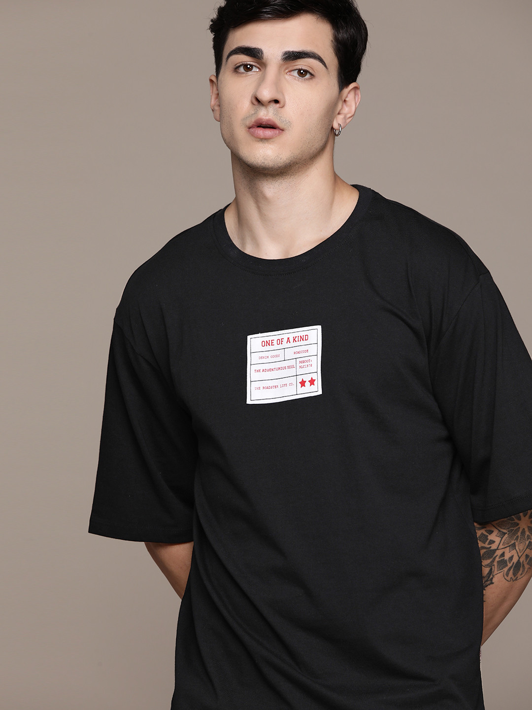 

The Roadster Lifestyle Co. Oversized Fit Drop-Shoulder Sleeves Pure Cotton Applique T-shirt, Black
