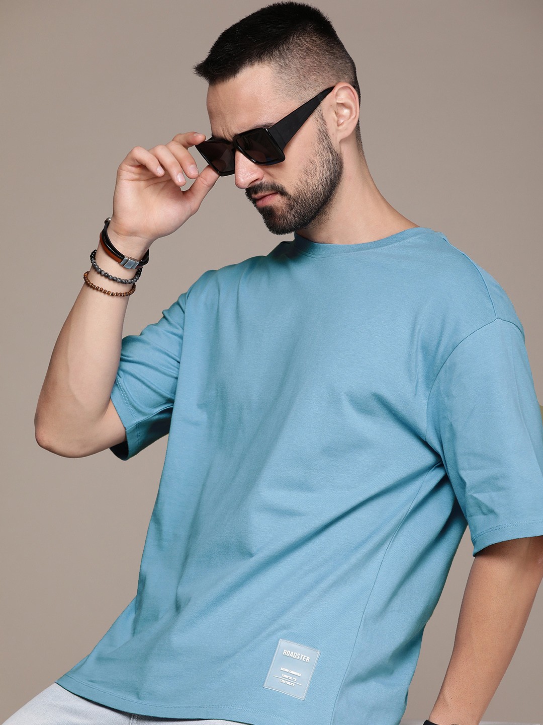 

The Roadster Lifestyle Co. Oversized Fit Solid Drop-Shoulder Sleeves Pure Cotton T-shirt, Blue