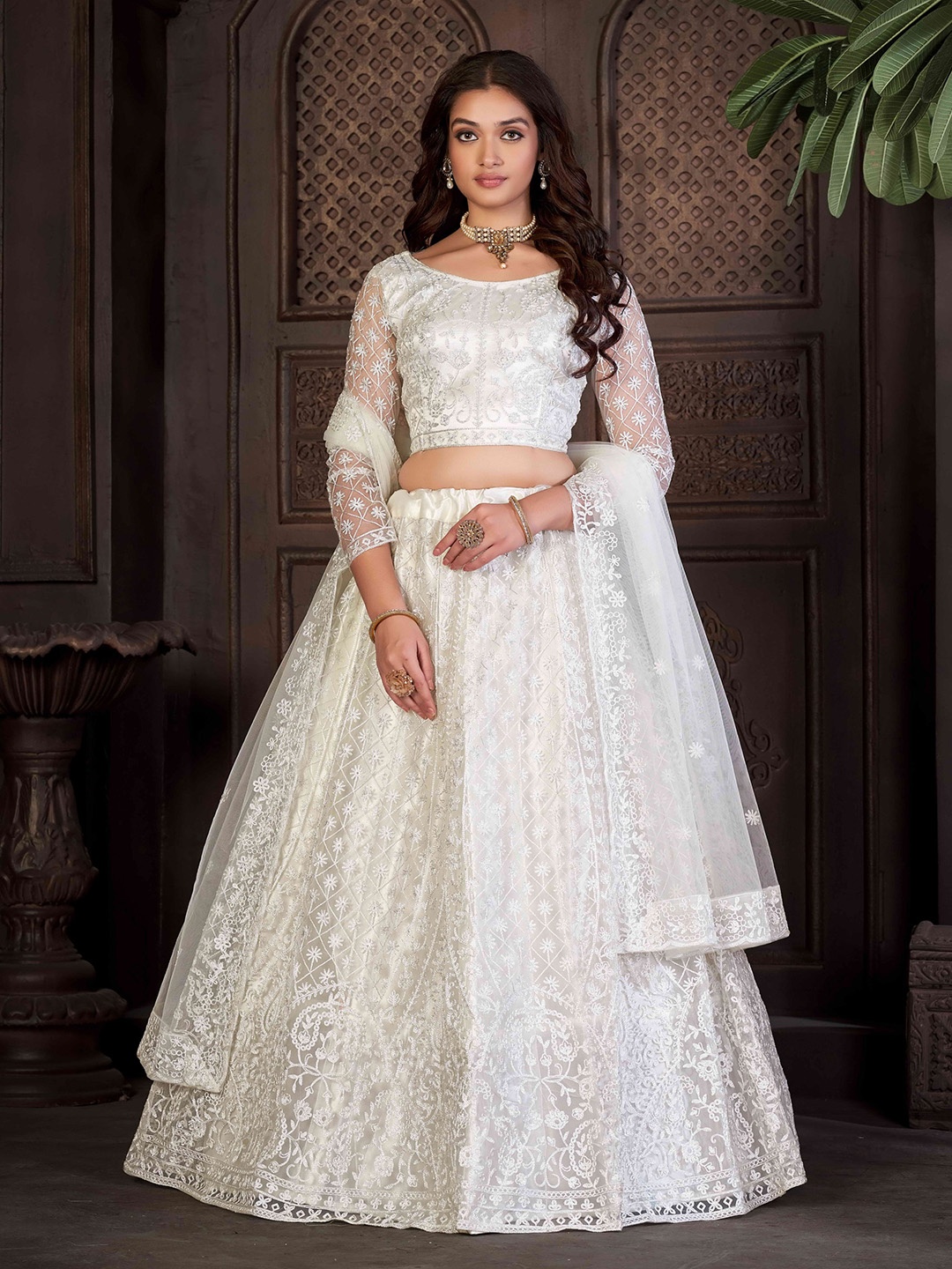 

Atsevam Ethnic Motifs Embroidered Thread Work Semi-Stitched Lehenga Choli, White