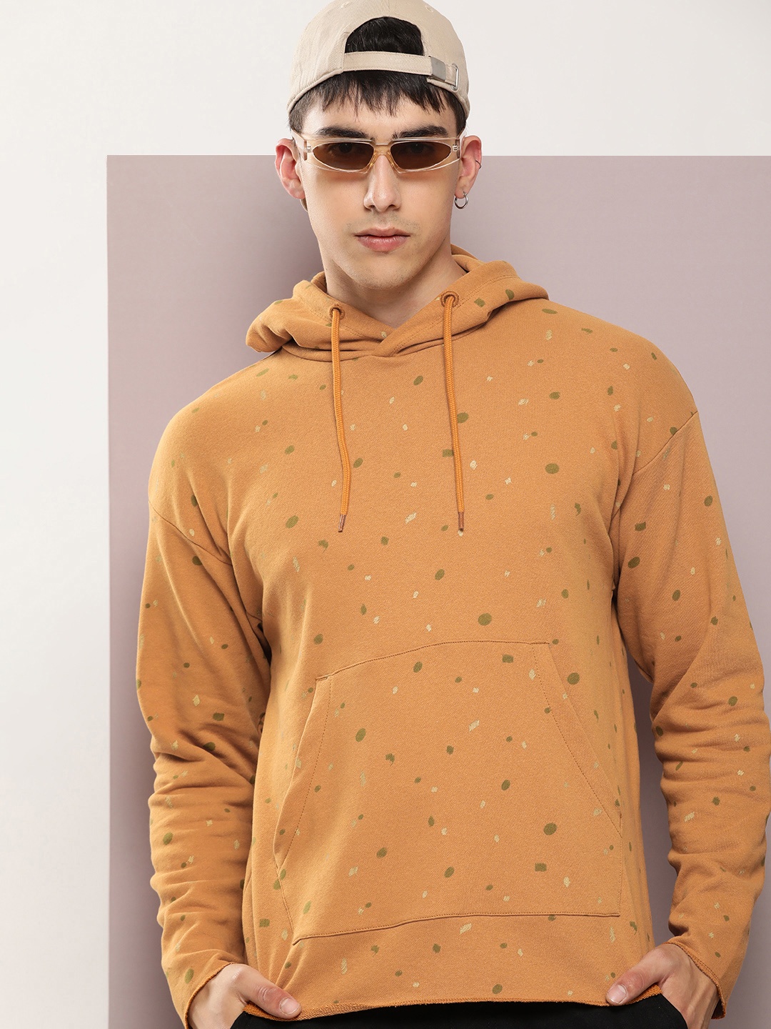 

Kook N Keech Men Abstract Printed Hooded Sweatshirt, Mustard
