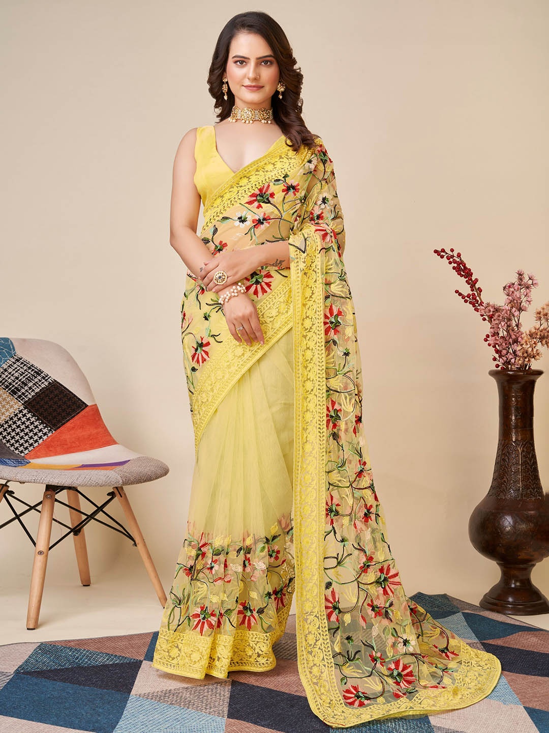 

HERE&NOW Yellow Floral Embroidered Net Saree