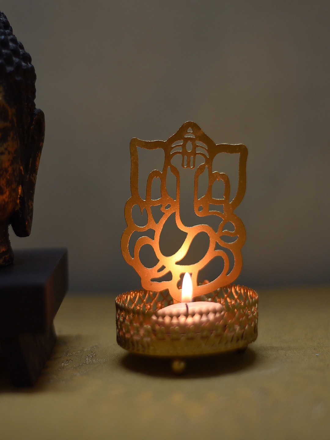 

eCraftIndia Brown Textured Ganesha Tea Light Holder, Gold