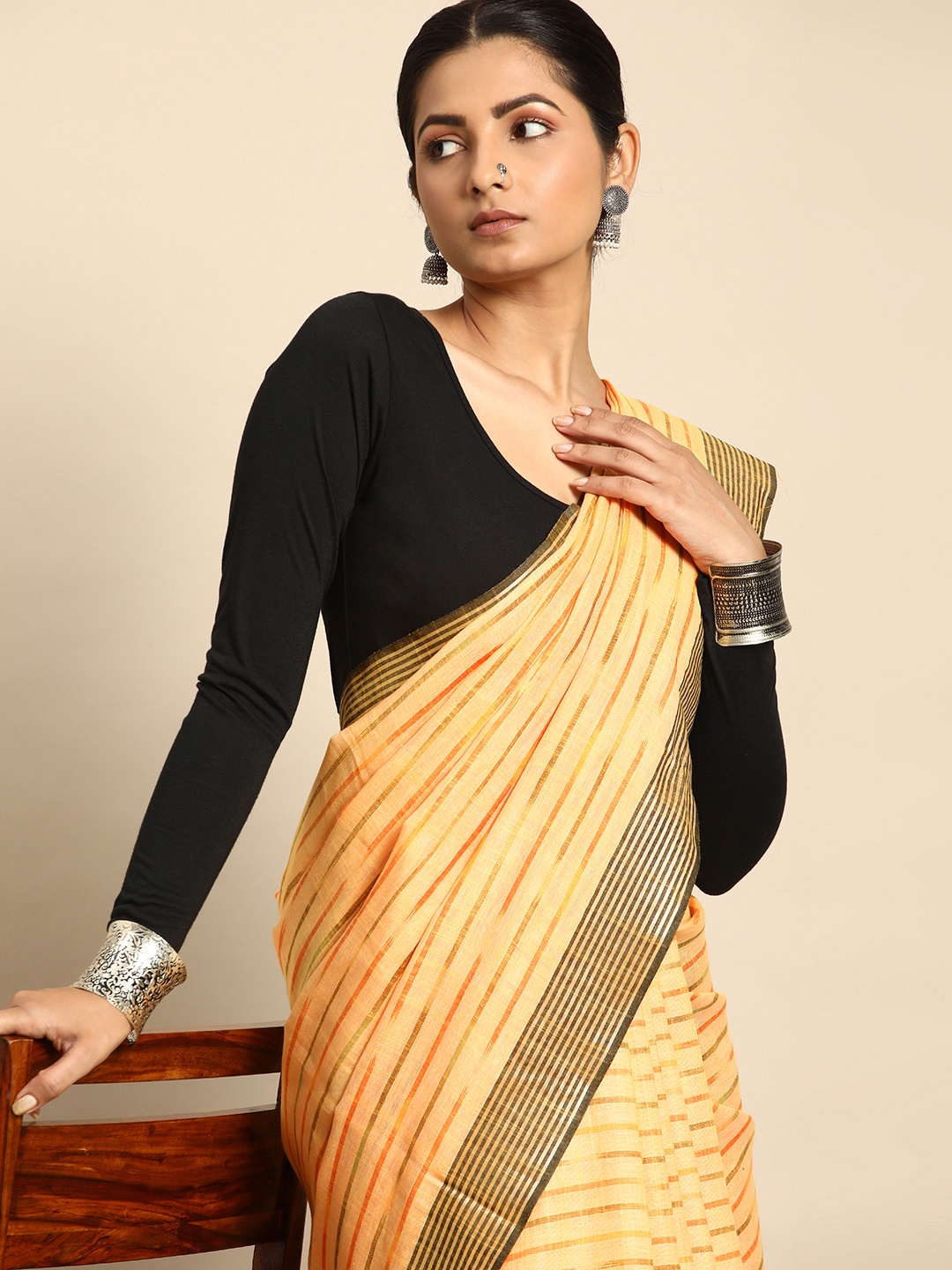 

Taavi Striped Zari Pure Cotton Ikat Saree, Yellow
