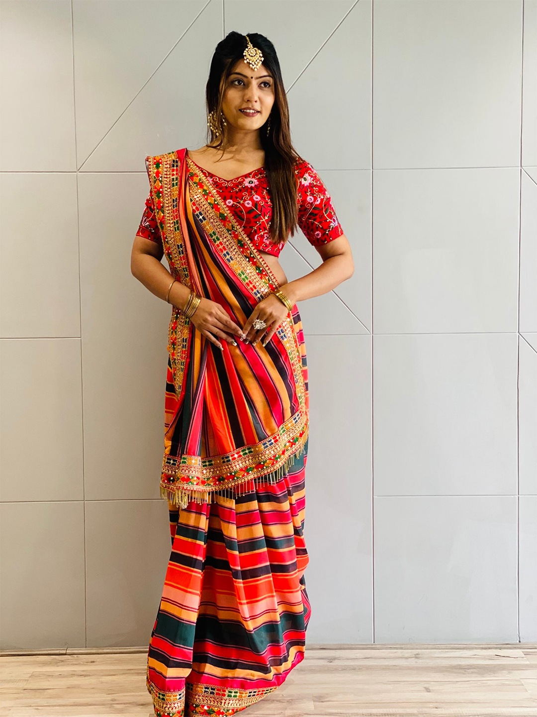 

Munir Striped Sequinned Leheriya Saree, Orange