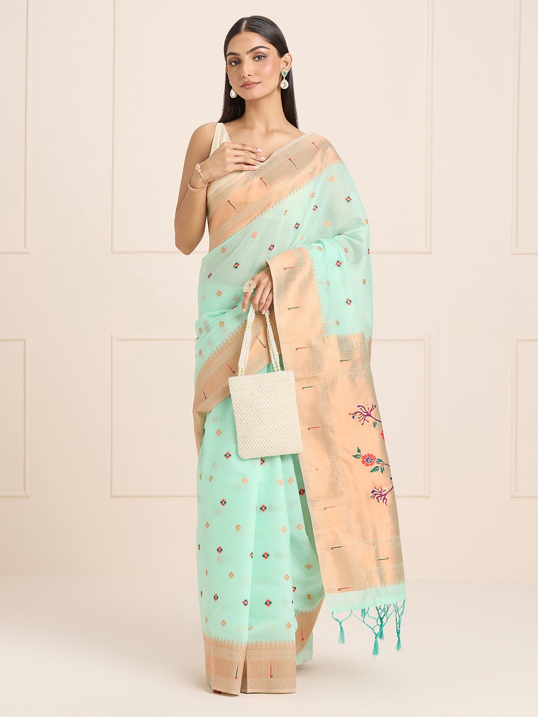 

Sangria Turquoise Blue Woven Design Zari Banarasi Saree
