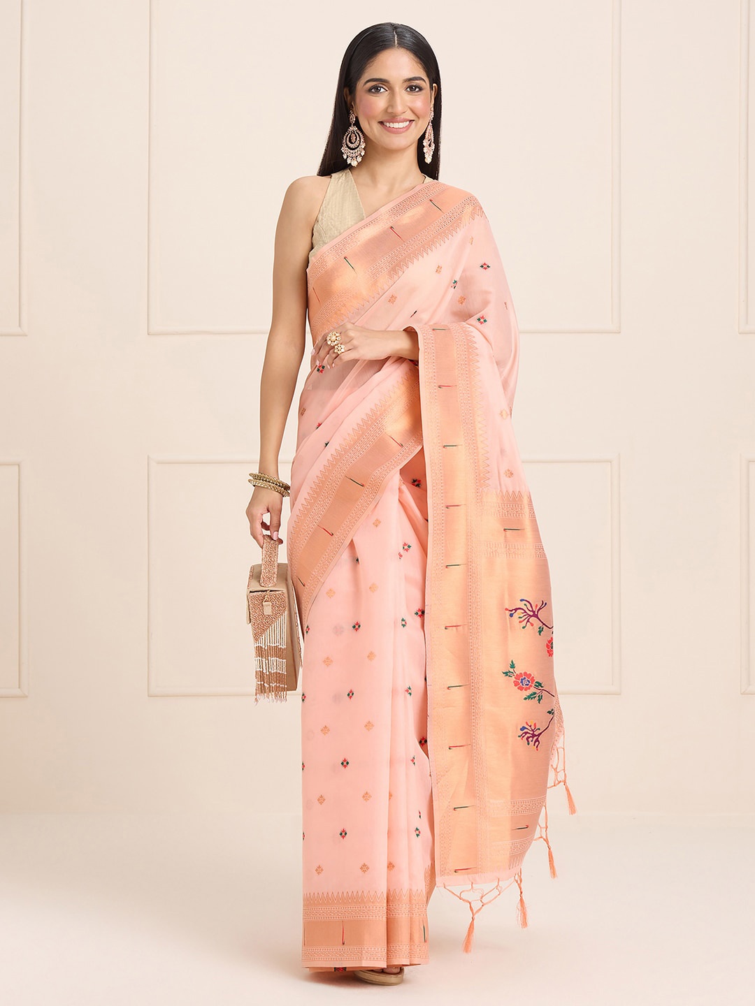 

Sangria Peach Coloured Ethnic Motifs Woven Design Sarees