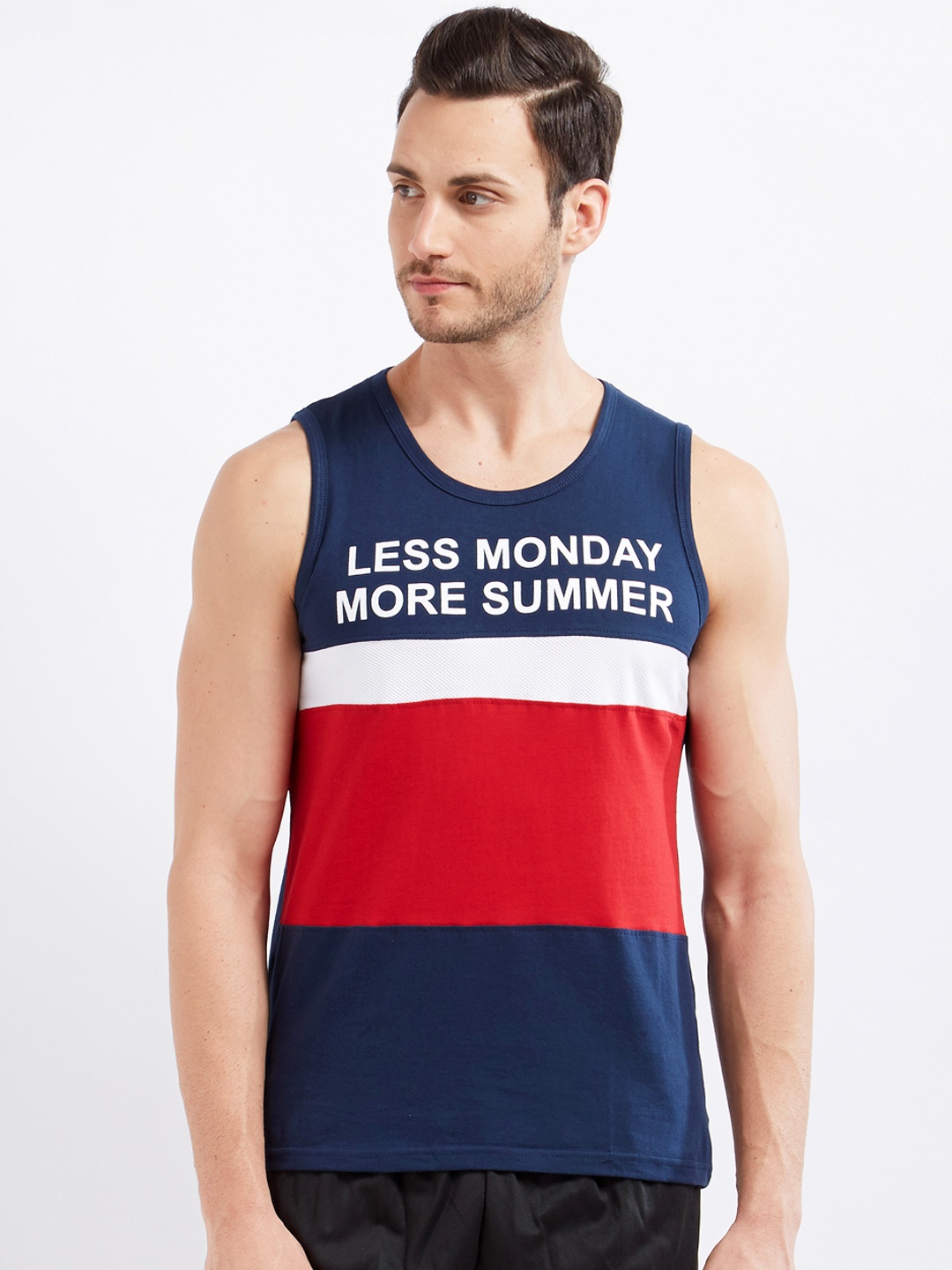 

Maniac Men Navy Blue & Red Colourblocked Round Neck T-shirt