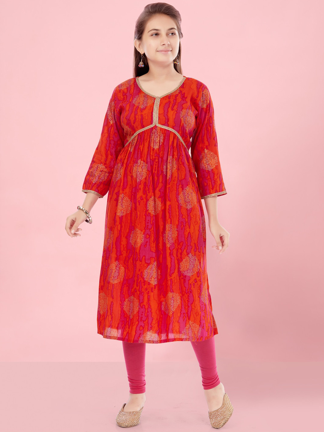 

Aarika Girls Ethnic Motifs Printed Pure Cotton Empire Kurta With Leggings, Orange