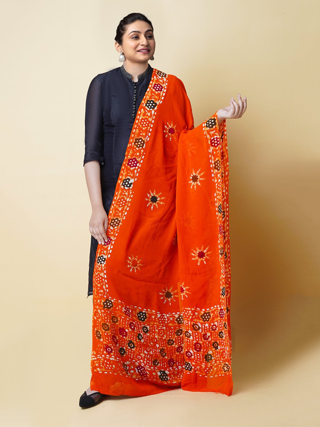 

Unnati SilksEthnic Motifs Printed Chiffon Batik Dupatta, Orange