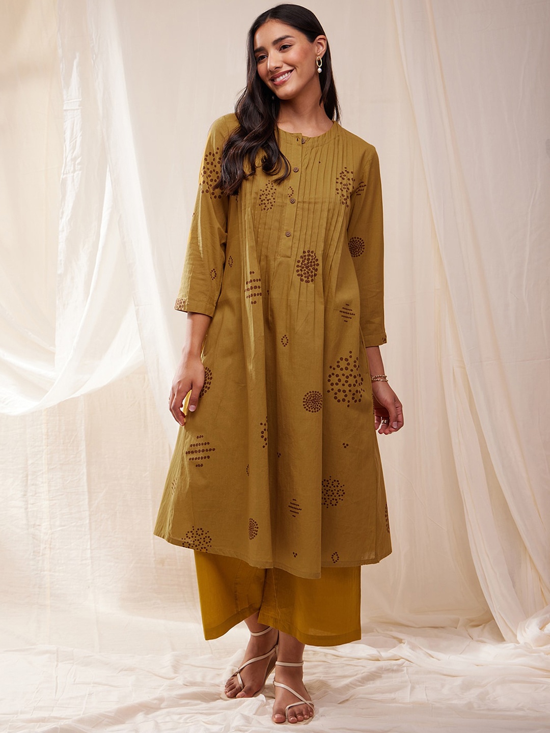 

Pink Fort Ethnic Motifs Prinred A-line Kurta, Mustard