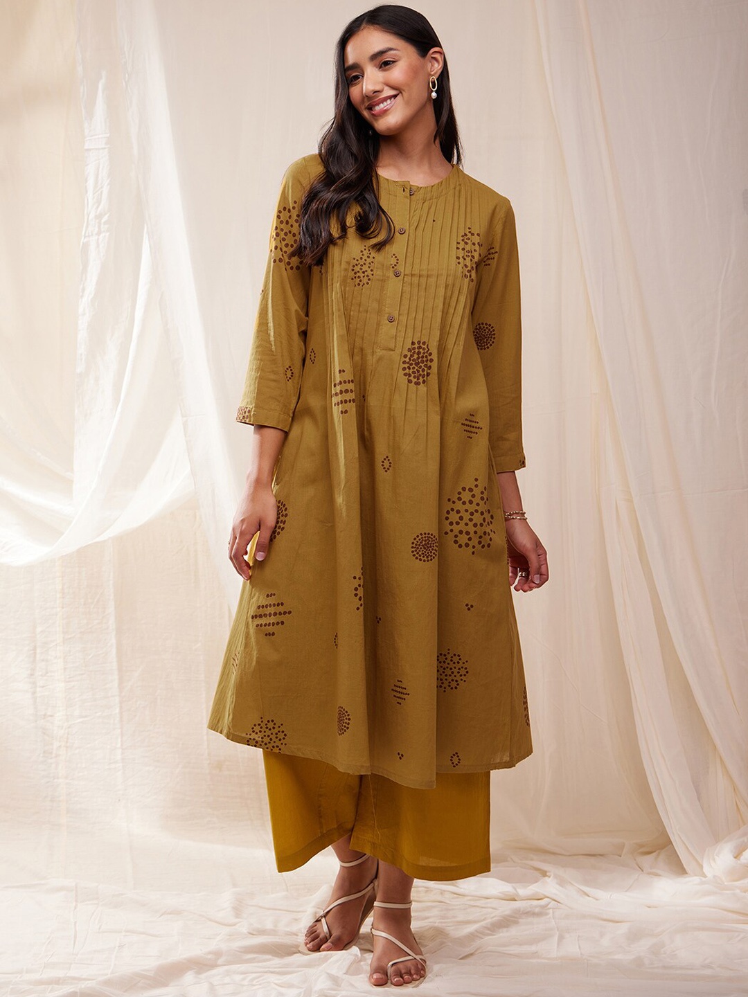 

Pink Fort Ethnic Motifs Printed A-Line Kurta With Palazzos, Mustard