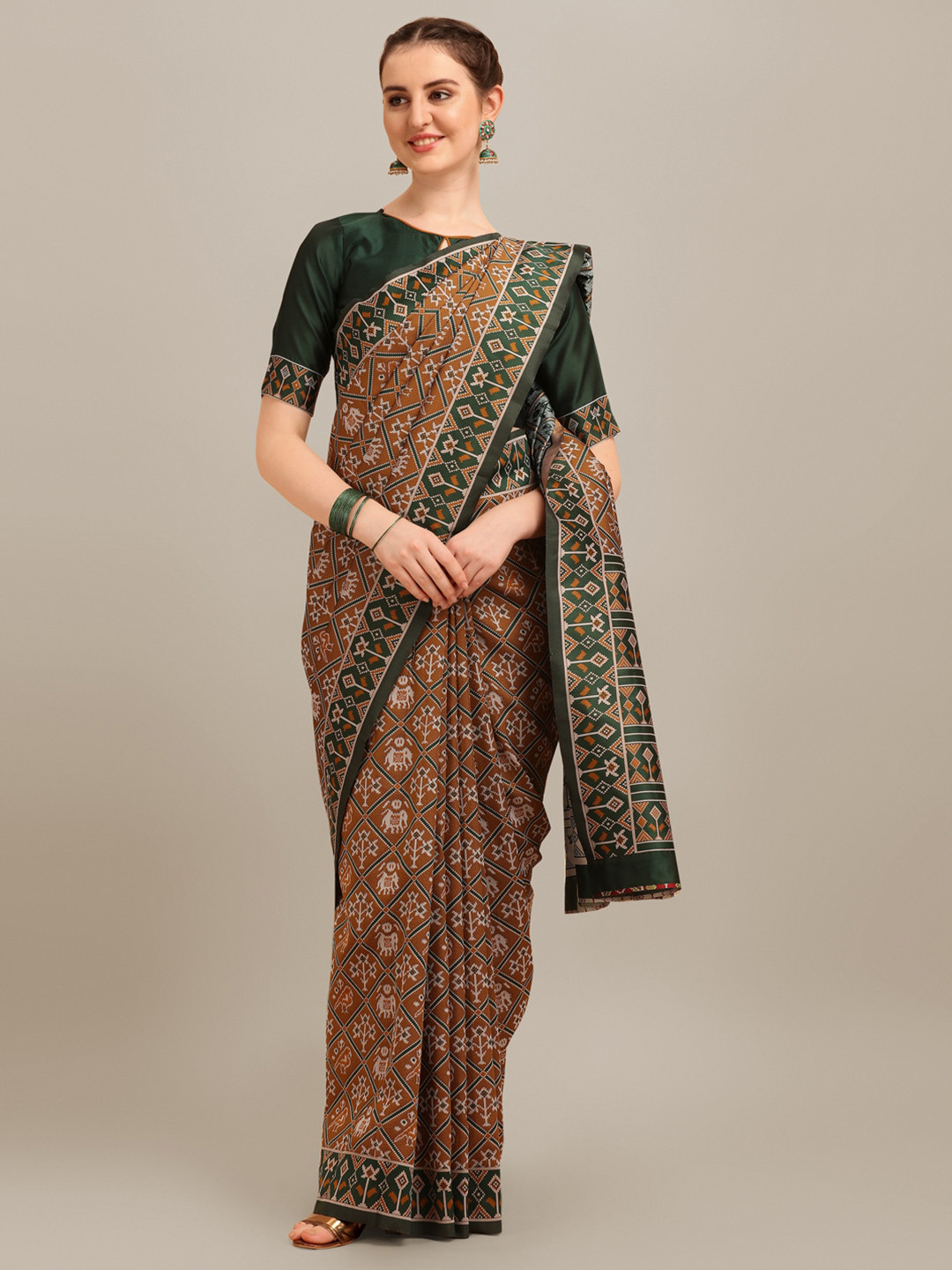 

Mitera Ethnic Motifs Woven Design Patola Saree, Gold