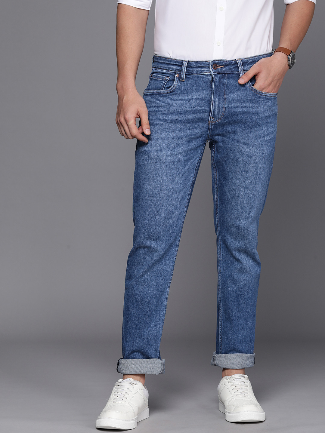 

Louis Philippe Jeans Men Mid-Rise Slim Fit Heavy Fade Stretchable Jeans, Blue