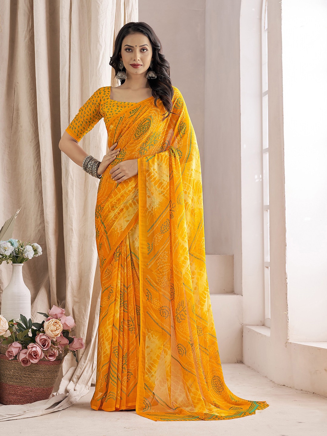 

Mitera Bandhani Ethnic Motifs Printed Saree, Yellow