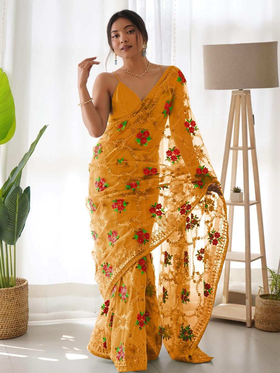 

Munir Ethnic Motifs Embroidered Net Saree, Yellow