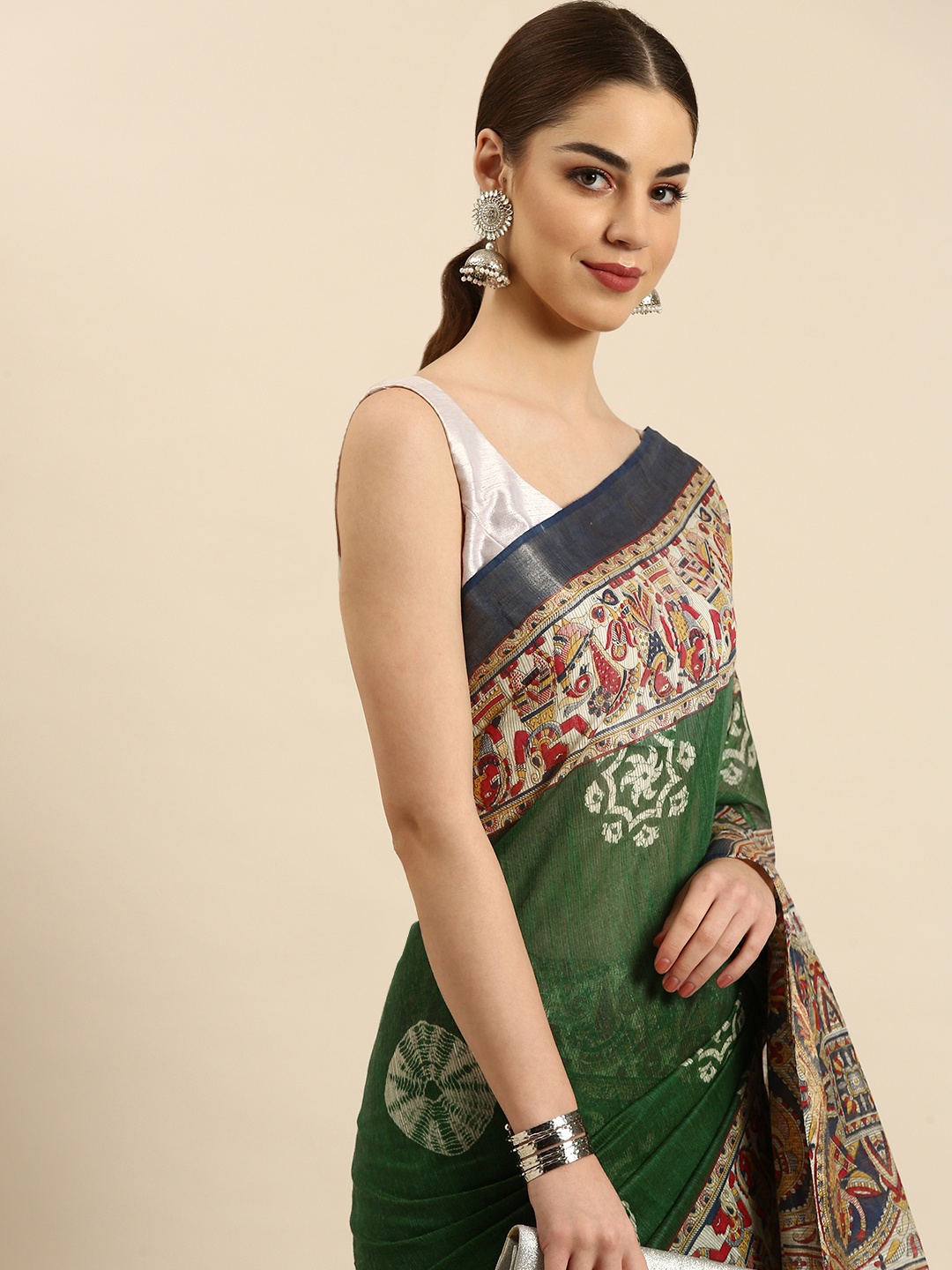 

swatika Ethnic Motifs Silk Blend Muga Saree, Green