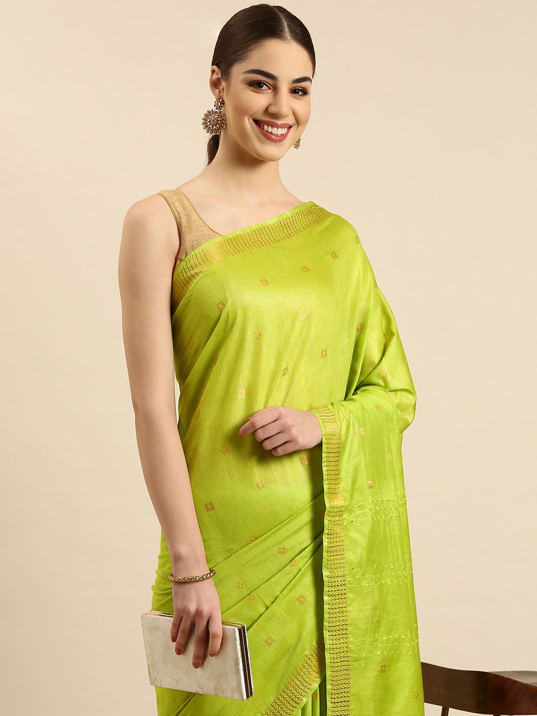 

swatika Woven Design Zari Silk Blend Muga Saree, Green