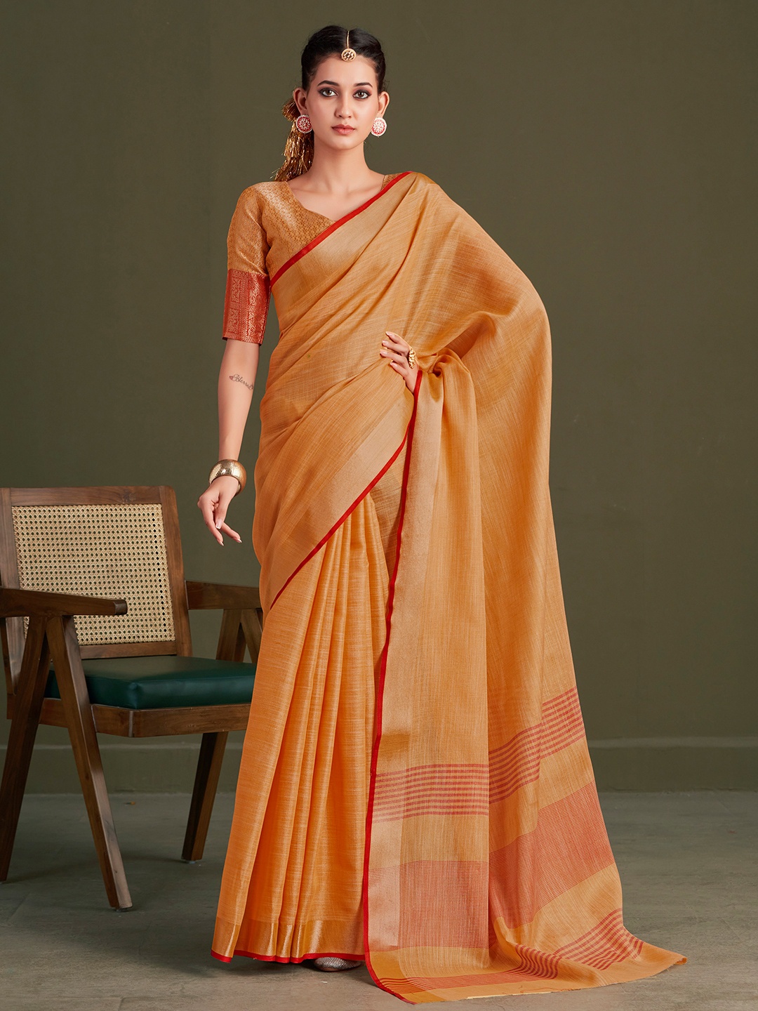 

Sangria Orange Woven Design Saree