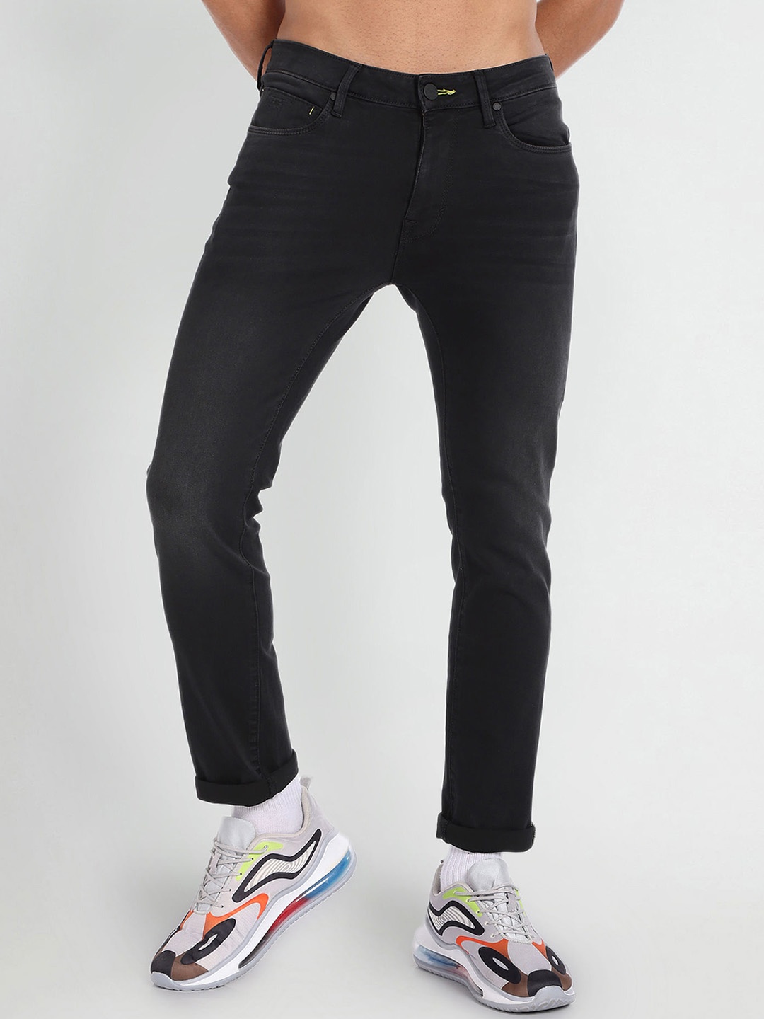 

Flying Machine Men Tapered Fit Mid-Rise Clean Look Stretchable Jeans, Black