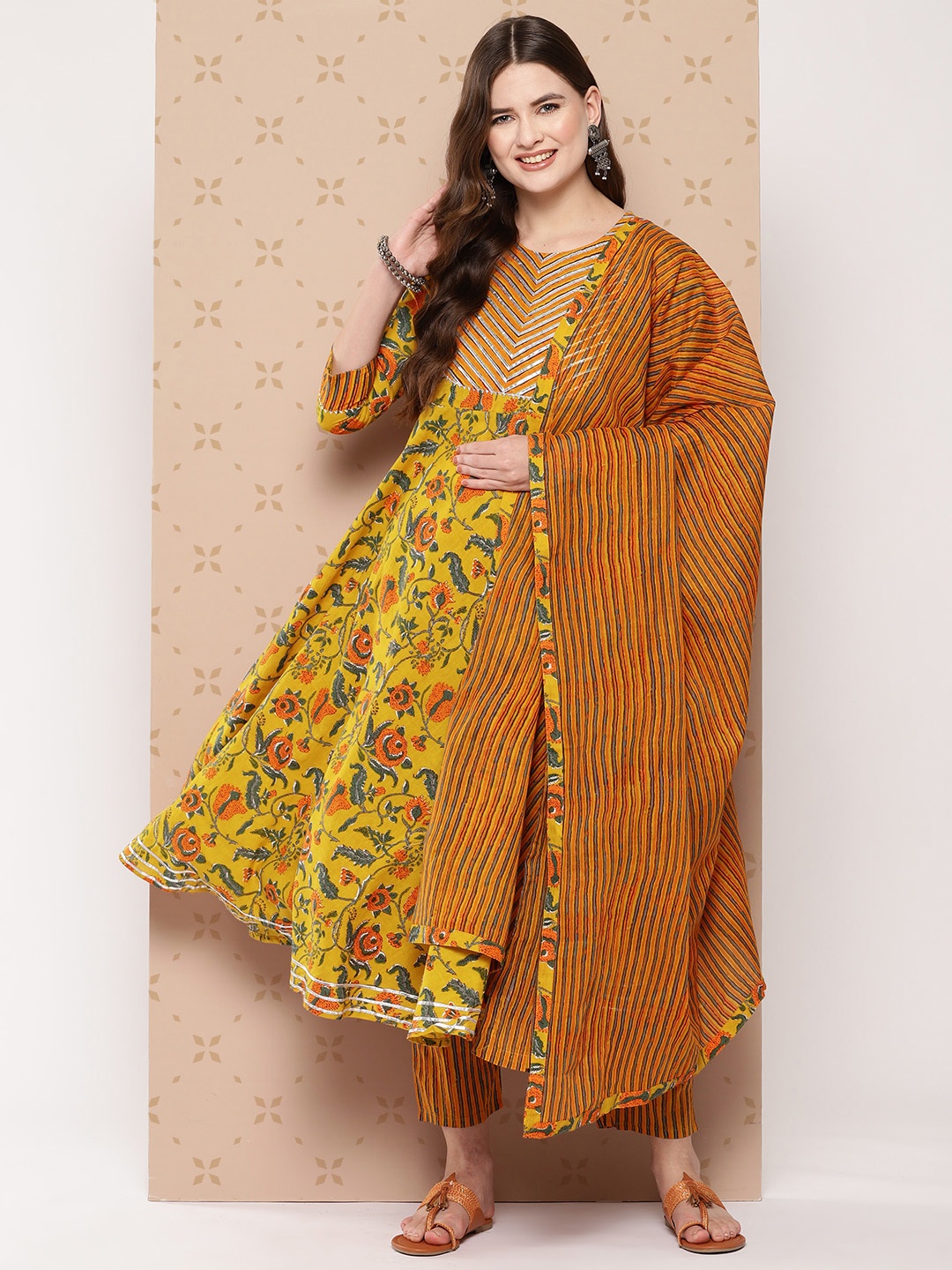 

KALINI Pure Cotton Floral Printed Anarkali Gotta Patti Kurta With Trousers & With Dupatta, Mustard