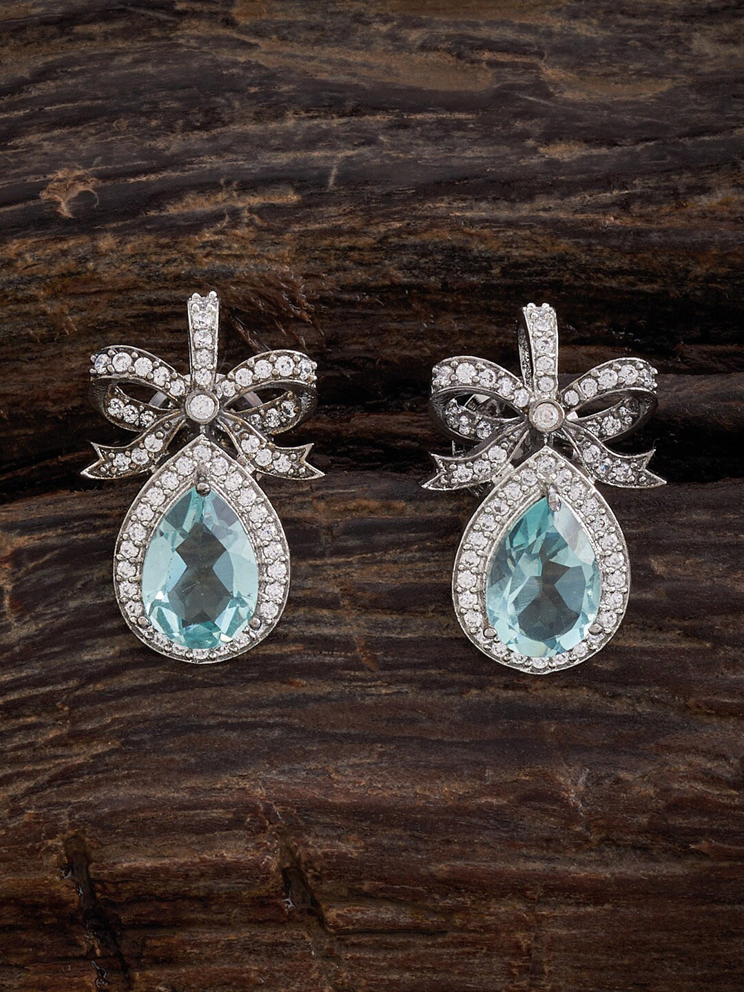 

Kushal's Fashion Jewellery Rhodium-Plated Zircon-Studded Teardrop Shaped Studs Earrings, Silver