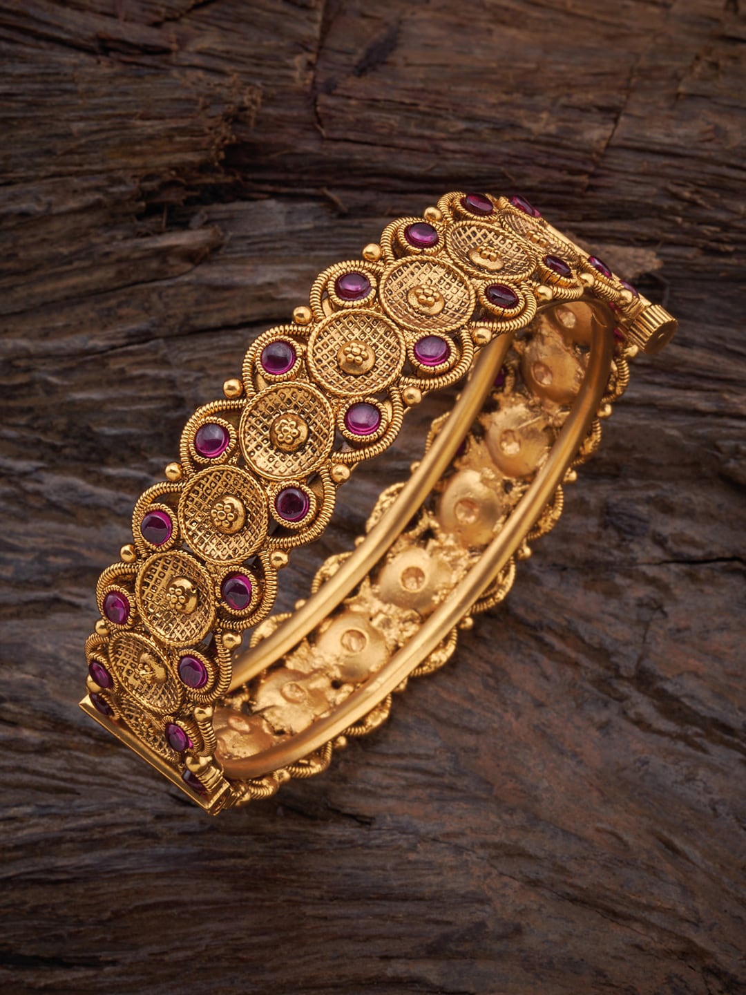 

Kushal's Fashion Jewellery Gold-Plated Artificial Stones-Studded Antique Bangle