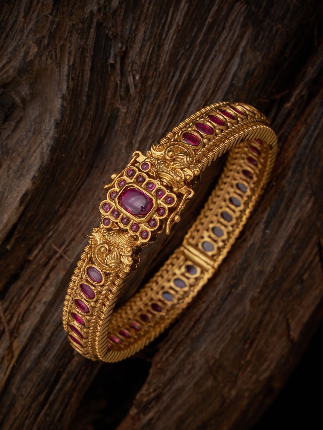 

Kushal's Fashion Jewellery Gold-Plated Stone-Studded Antique Kada Bracelet
