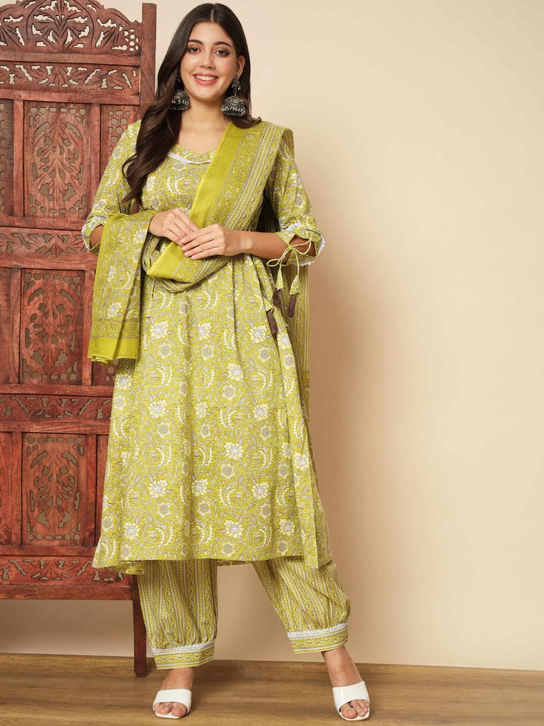 

Vbuyz Ethnic Motifs Printed Tie Ups Detail A-Line Kurta With Salwar & Dupatta, Green