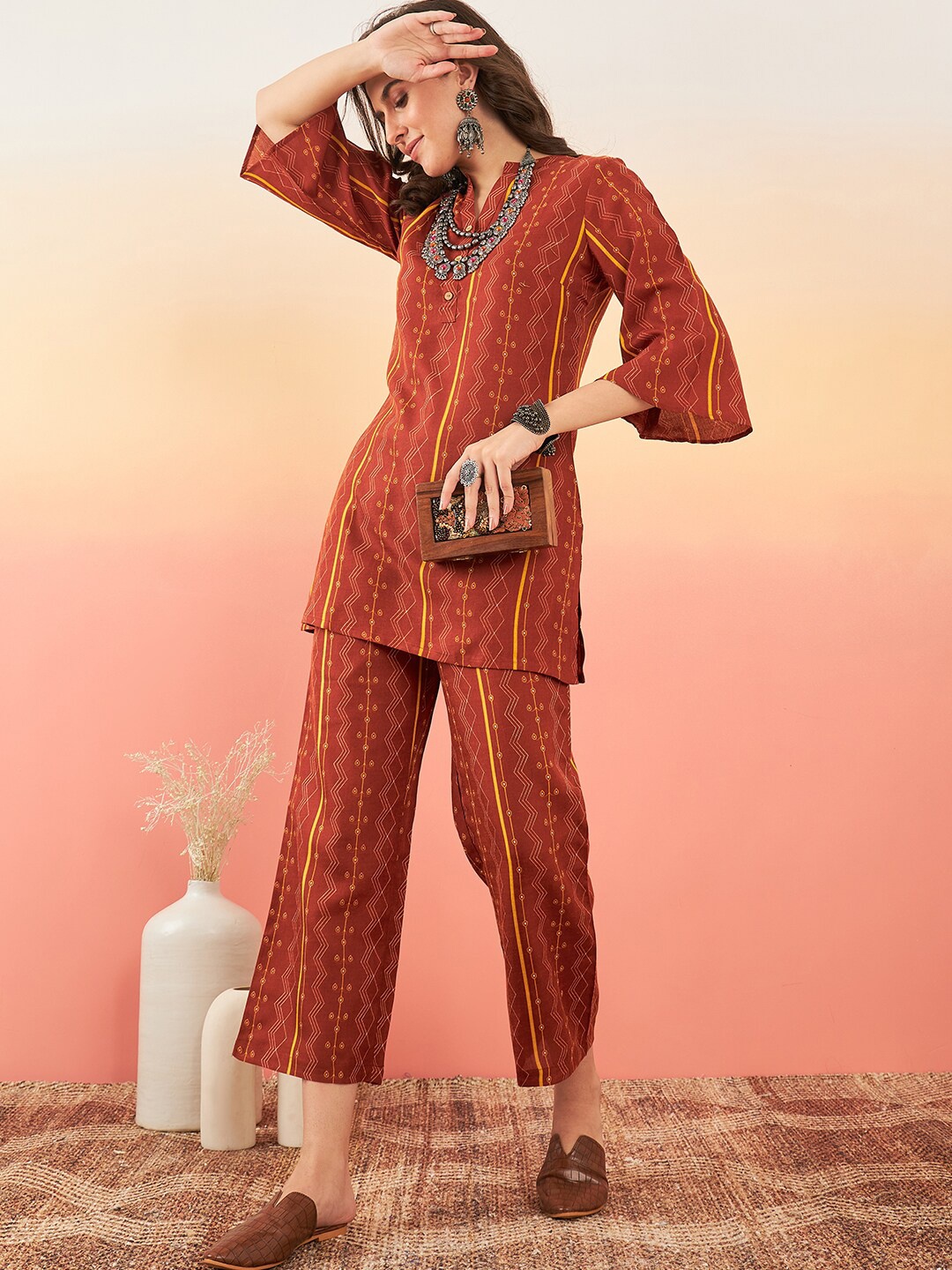 

Sangria Geometric Printed Mandarin Collar Kurti With Trouser, Brown