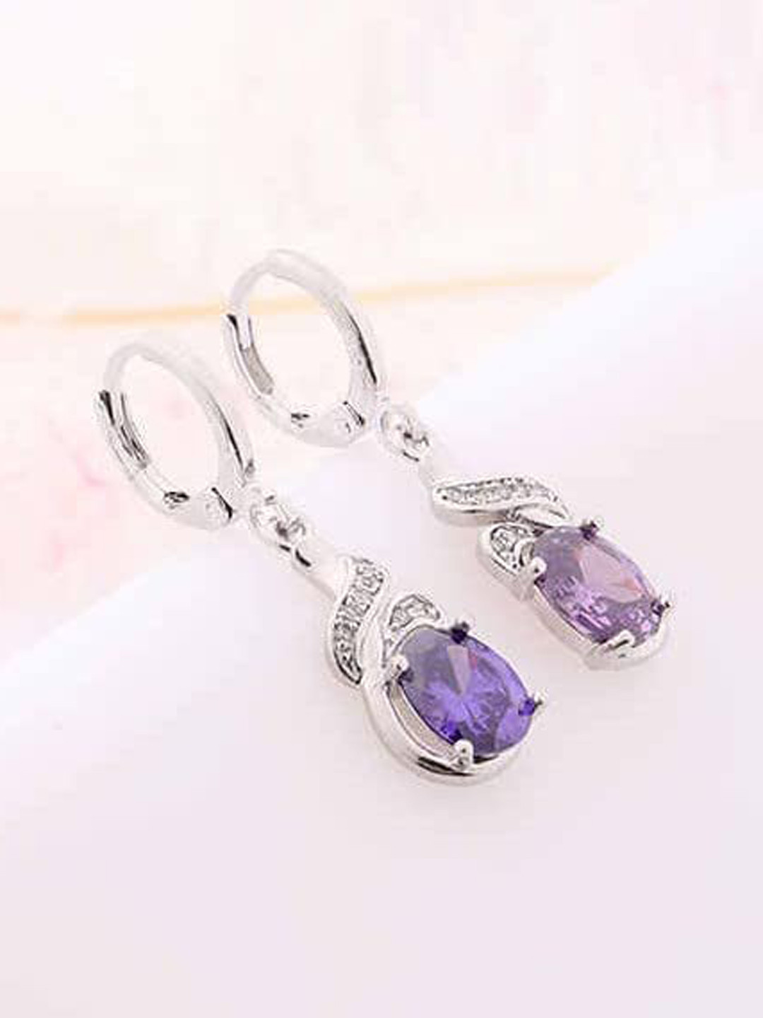 

KRYSTALZ Silver-Plated Teardrop Shaped Drop Earrings